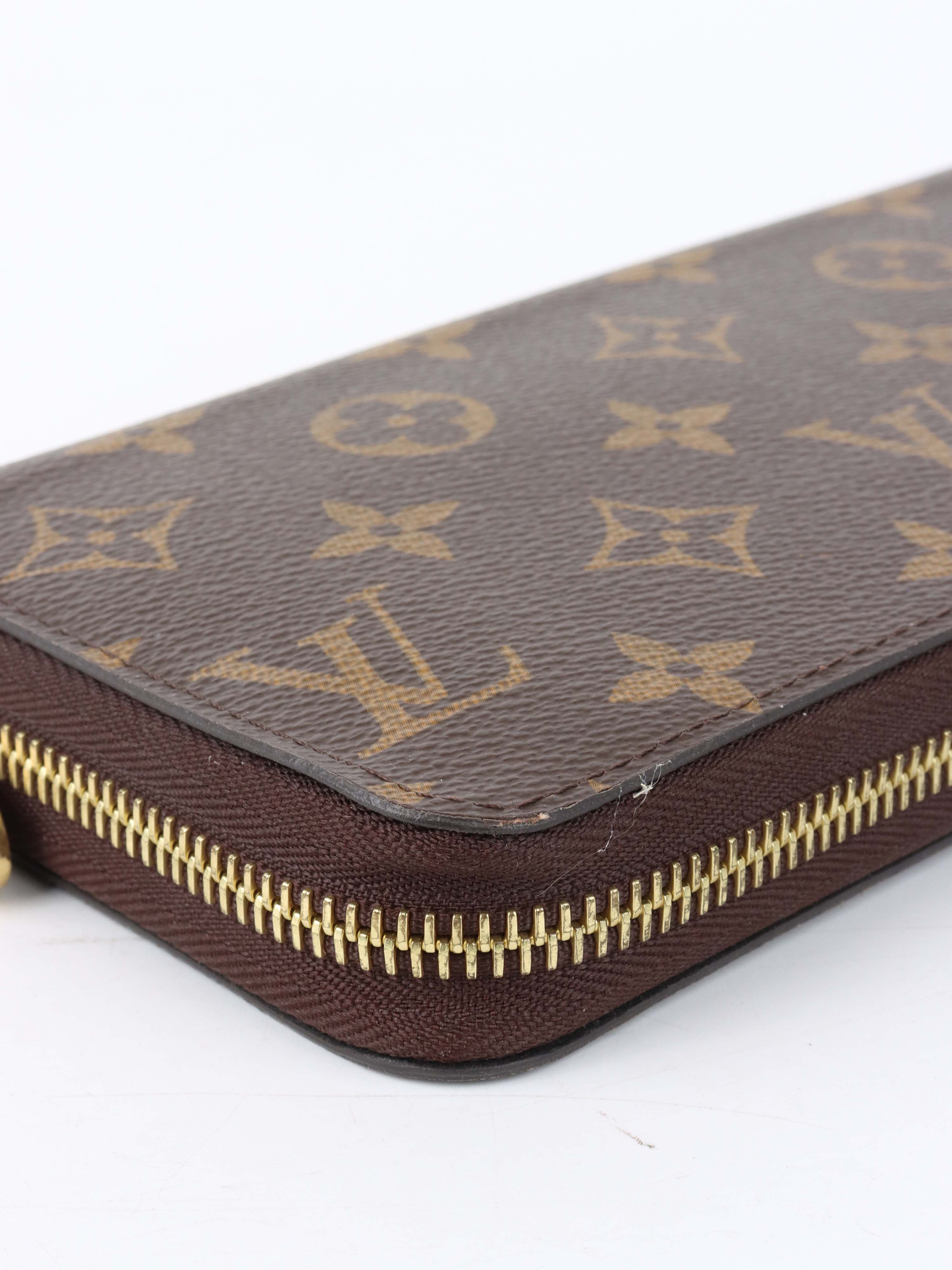 Louis Vuitton Monogram Zippy Long Wallet.