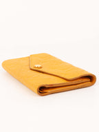Louis Vuitton Saffran Empreinte Leather Compact Wallet.
