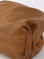 Bottega Veneta Pouch in Tan.