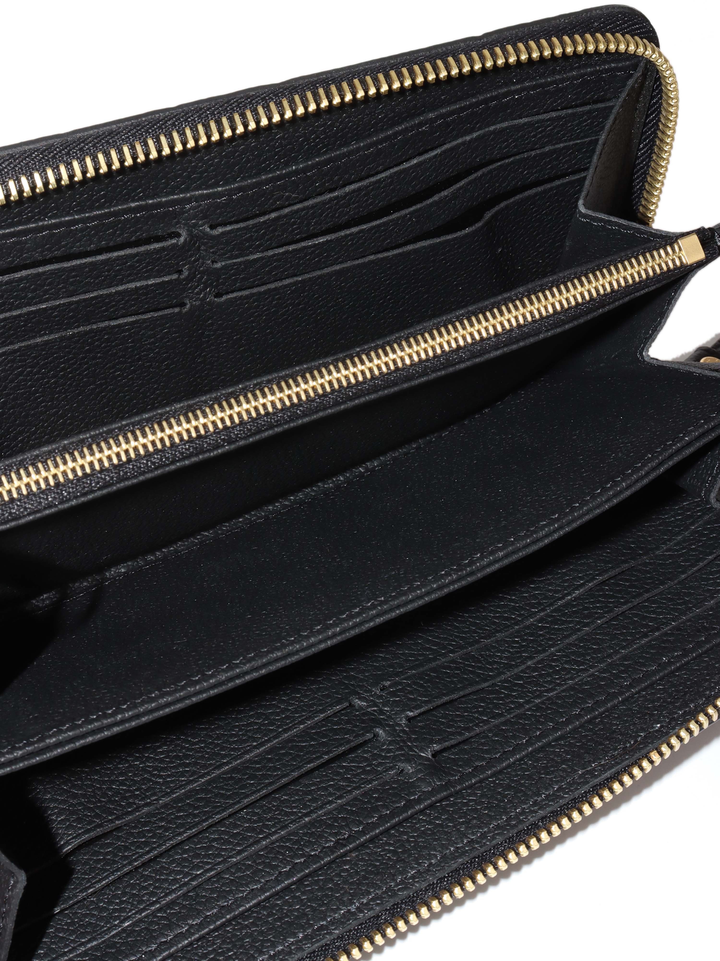 Louis Vuitton Black Monogram Empreinte Leather Clemence Wallet.