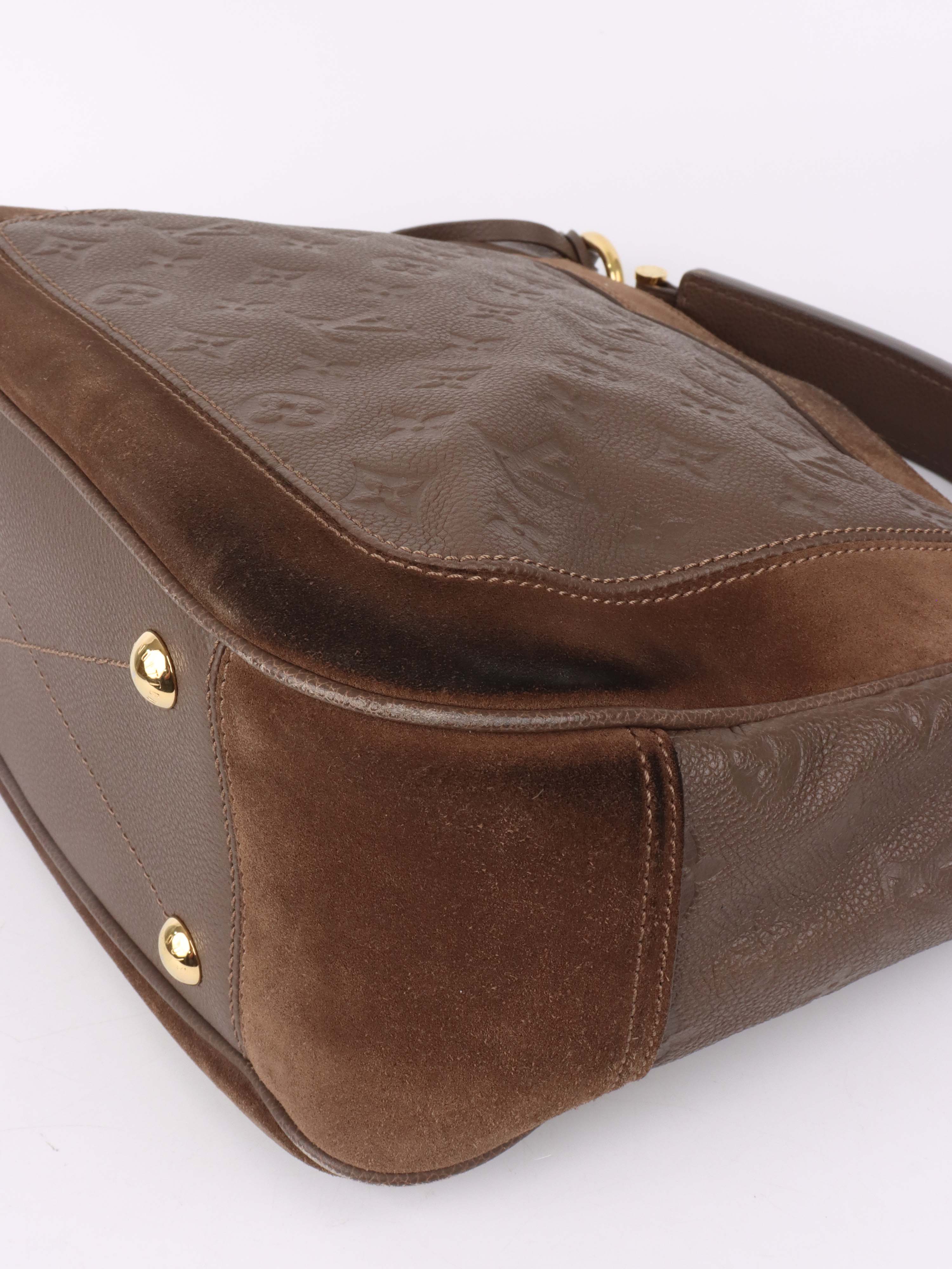 Louis Vuitton Terre Empreinte Monogram Audacieuse PM Bag.