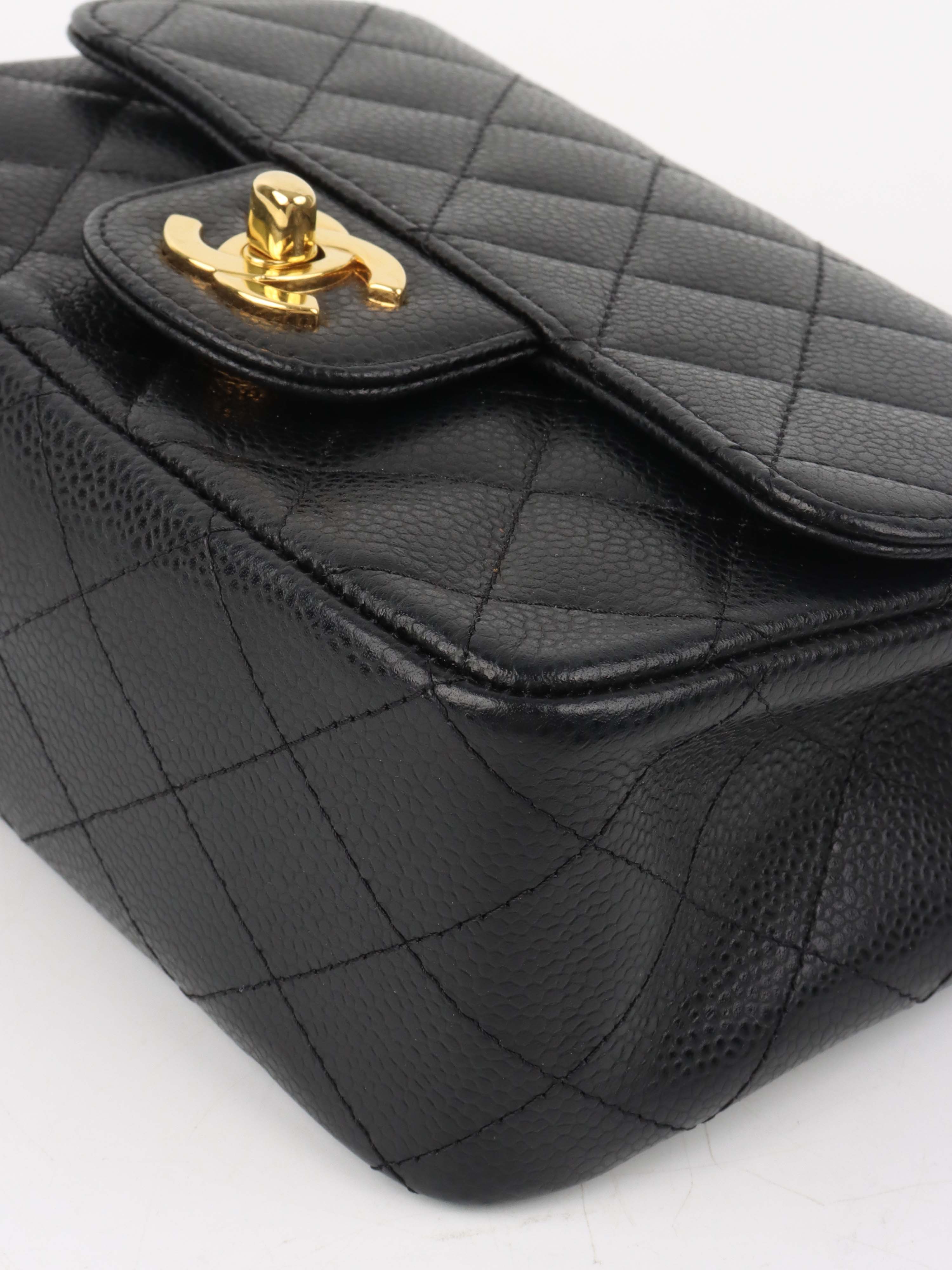 Chanel Black Mini Caviar Square Flap Bag.