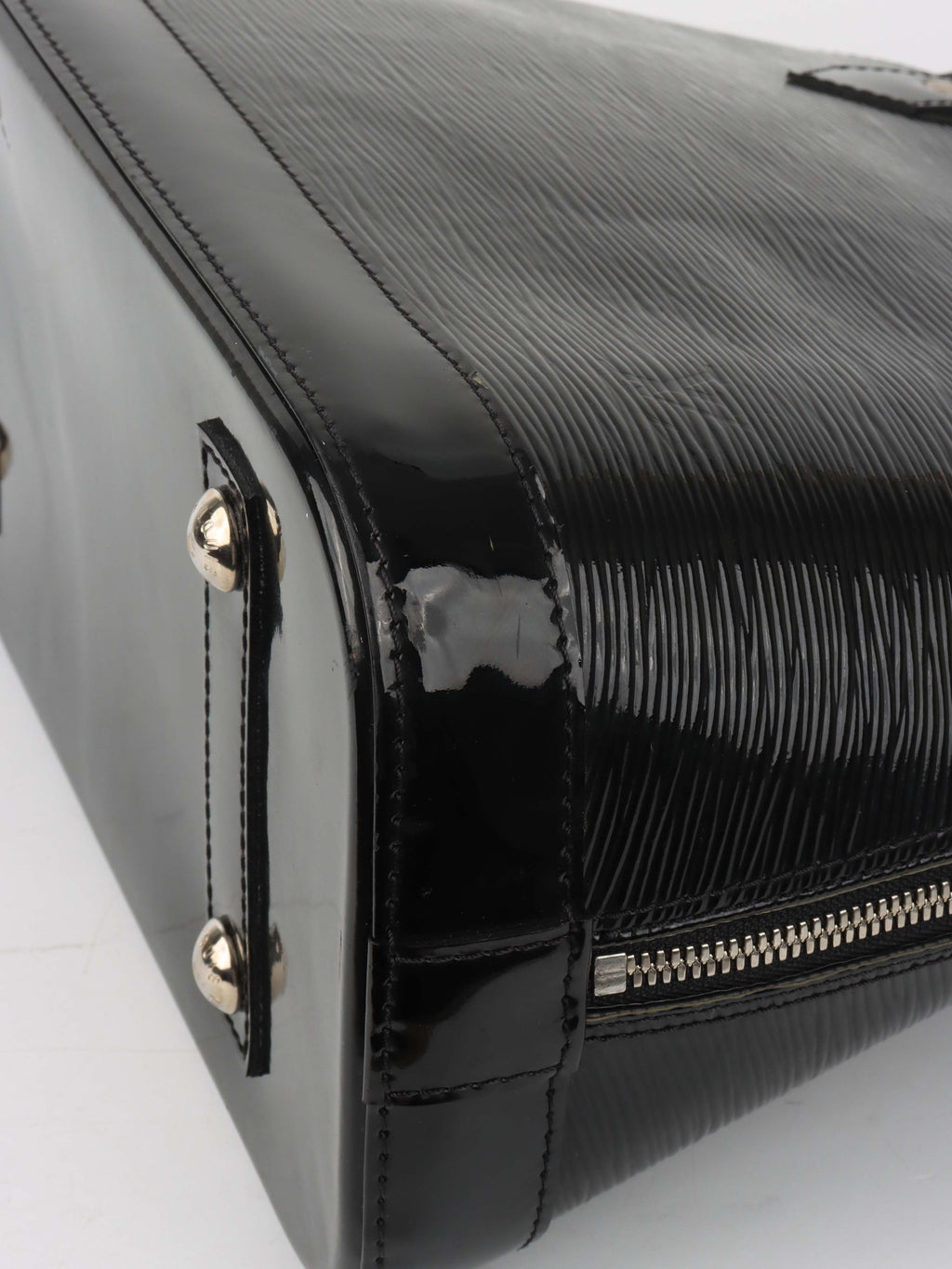 Louis Vuitton Epi Leather Alma PM bag.