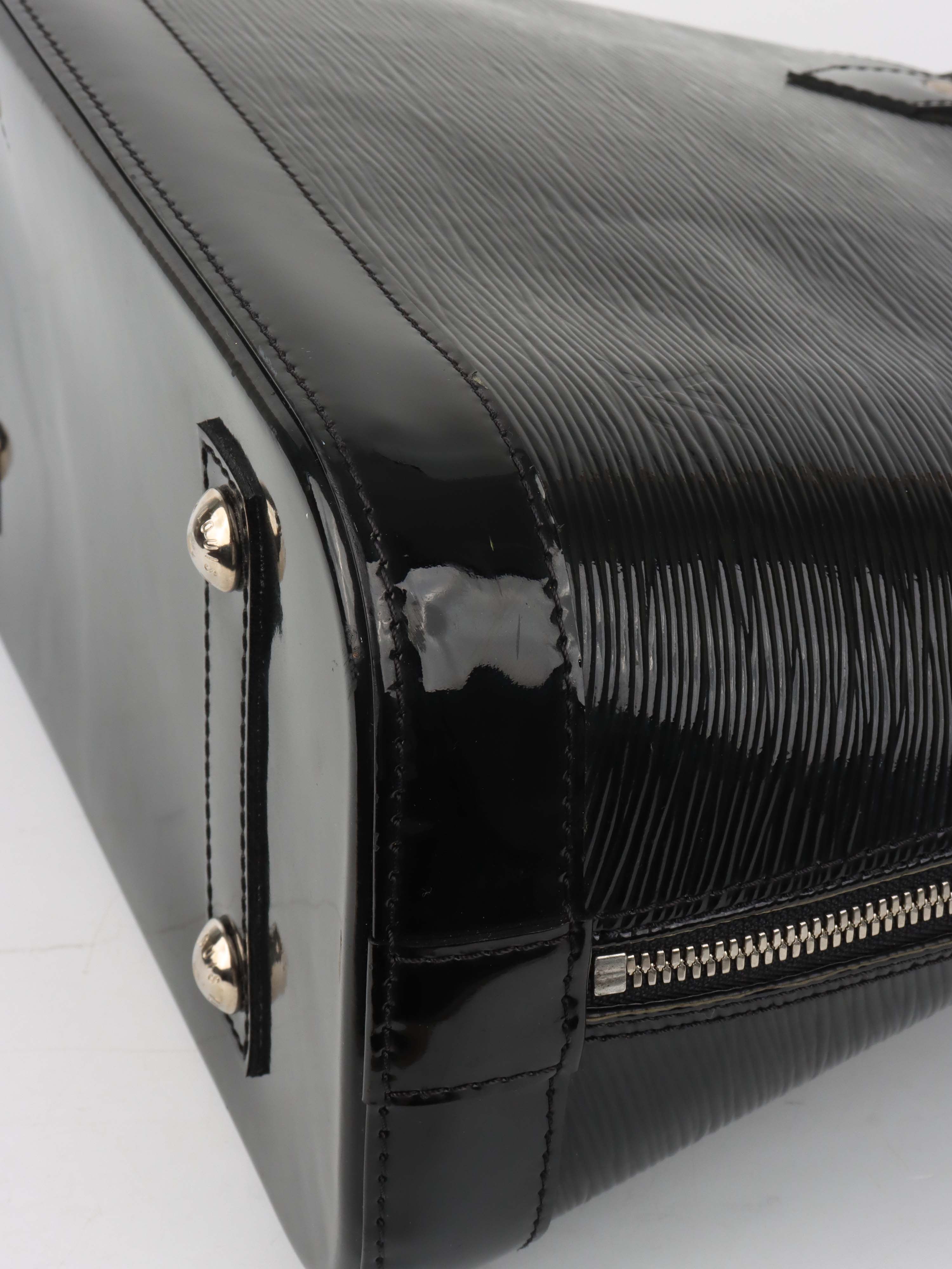 Louis Vuitton Epi Leather Alma PM bag.
