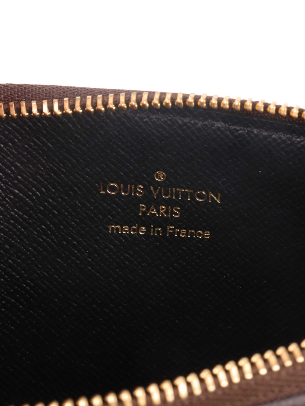 Louis Vuitton Monogram Trio Pouch.