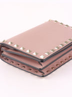 Valentino Garavani Pink Rockstud Cross Body Bag.