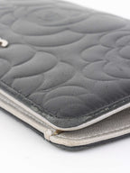 Chanel Black Camellia Wallet.