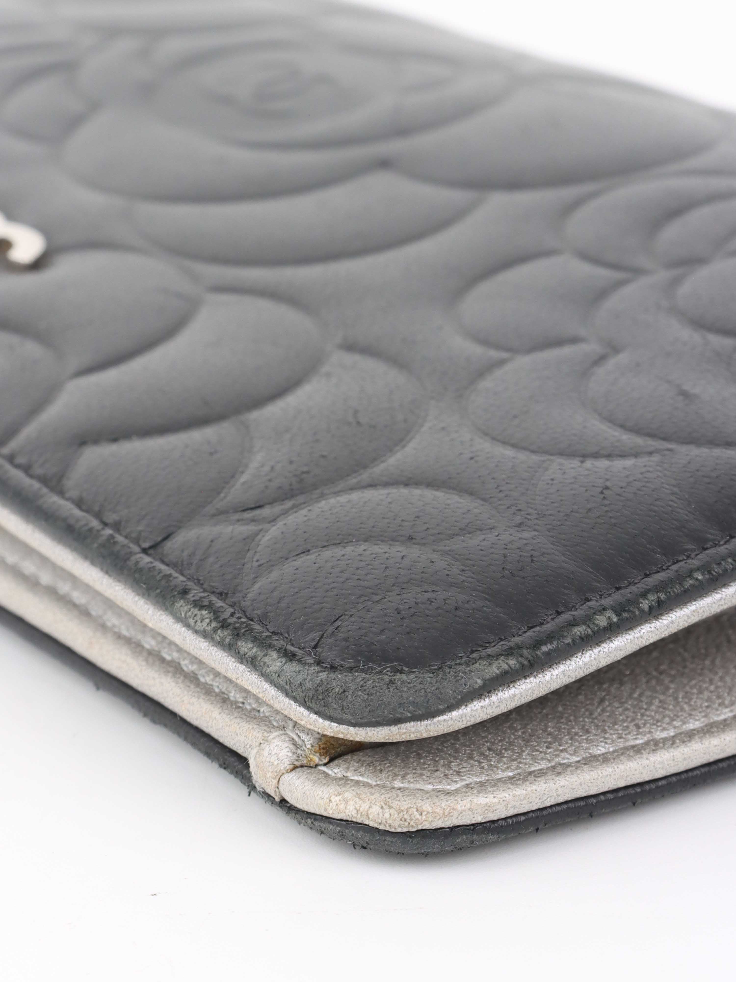 Chanel Black Camellia Wallet.