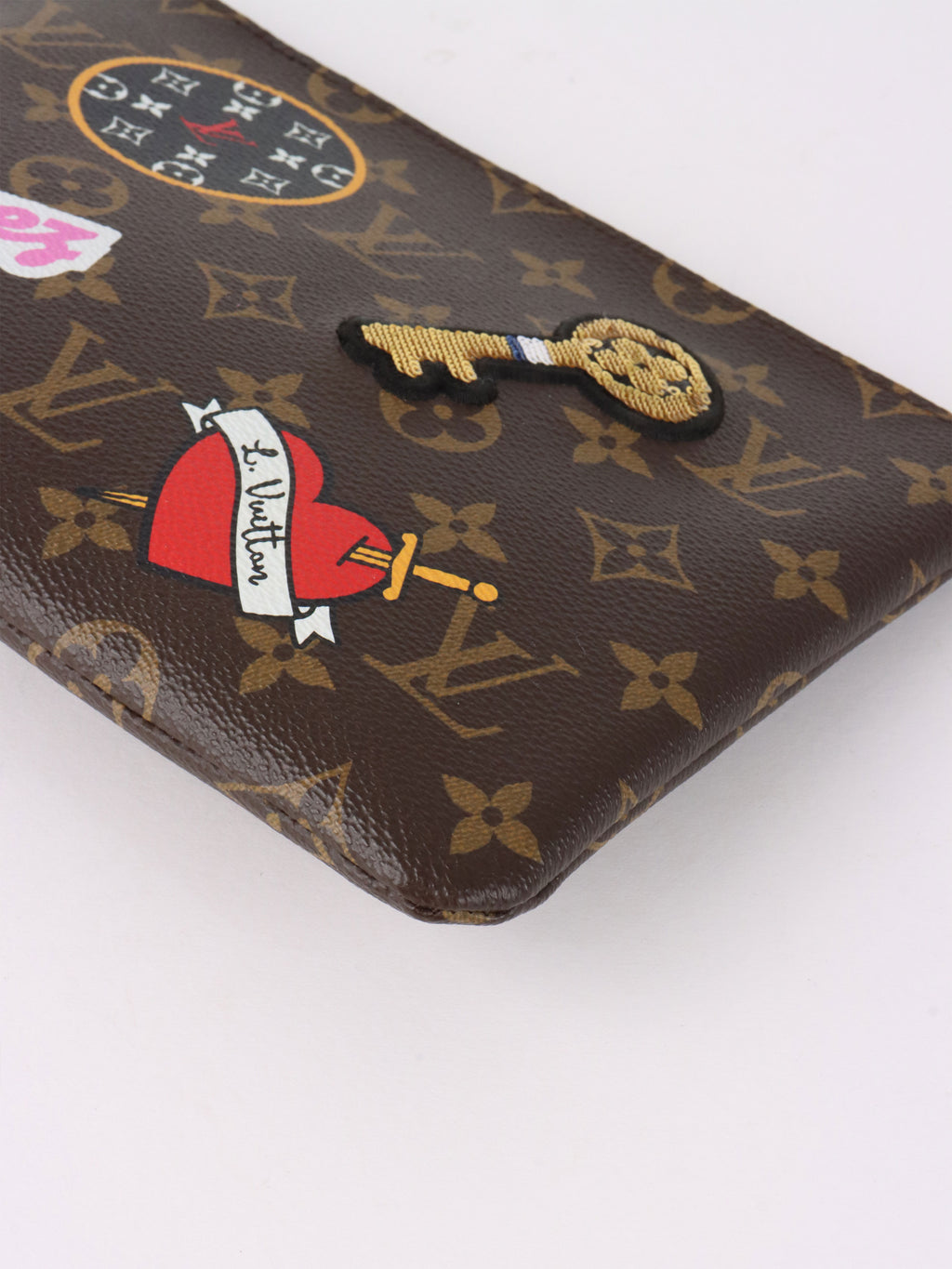 Louis Vuitton Limited Edition Monogram Patches City Pouch Bag.