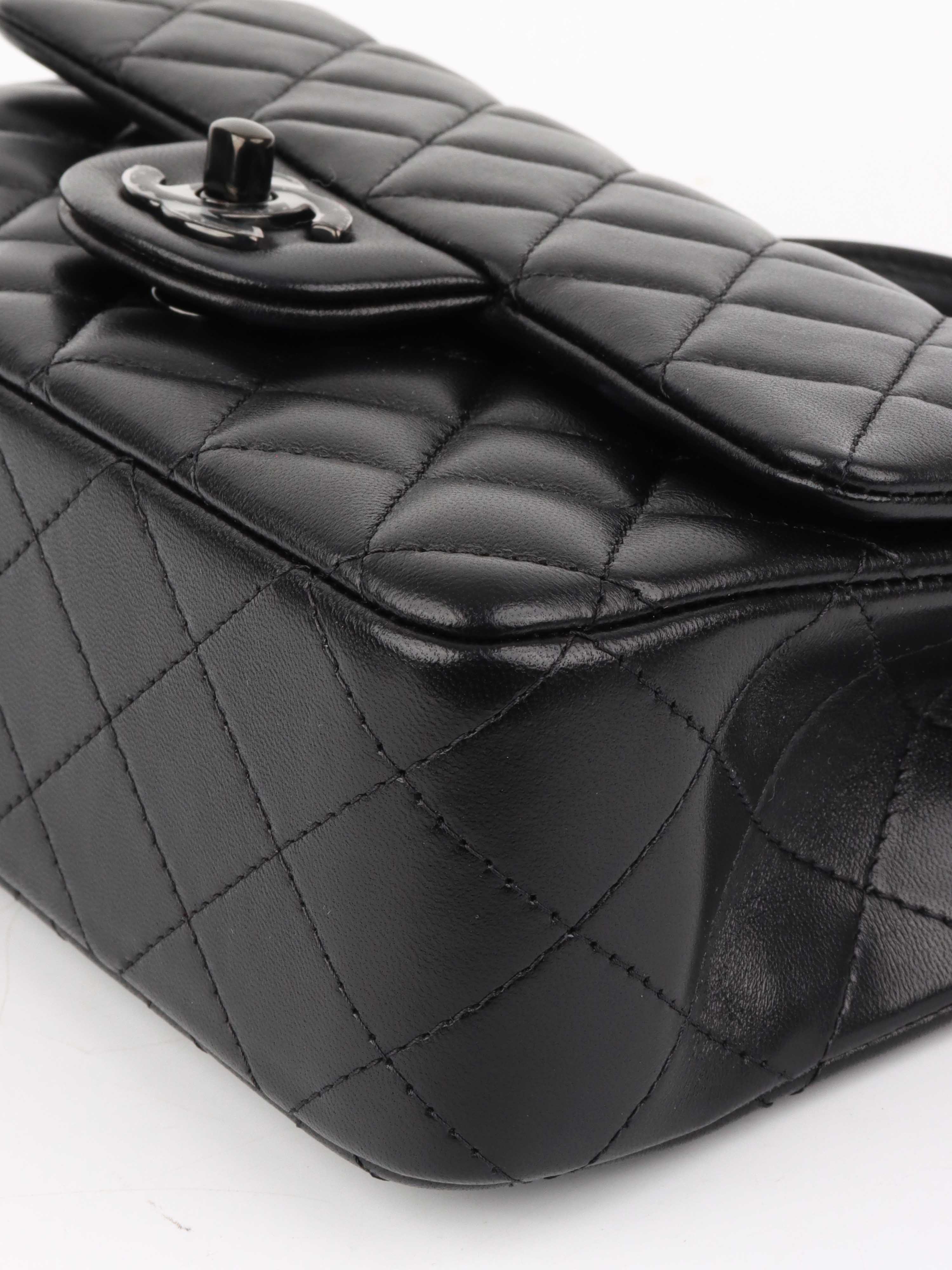 Chanel All Black Rectangular Classic Flap with Handle.