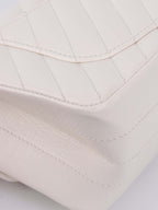 Chanel Small White Chevron 2.55 Bag.