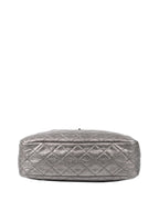 Chanel Metallic Silver 2.55 Reissue Camera Bag.