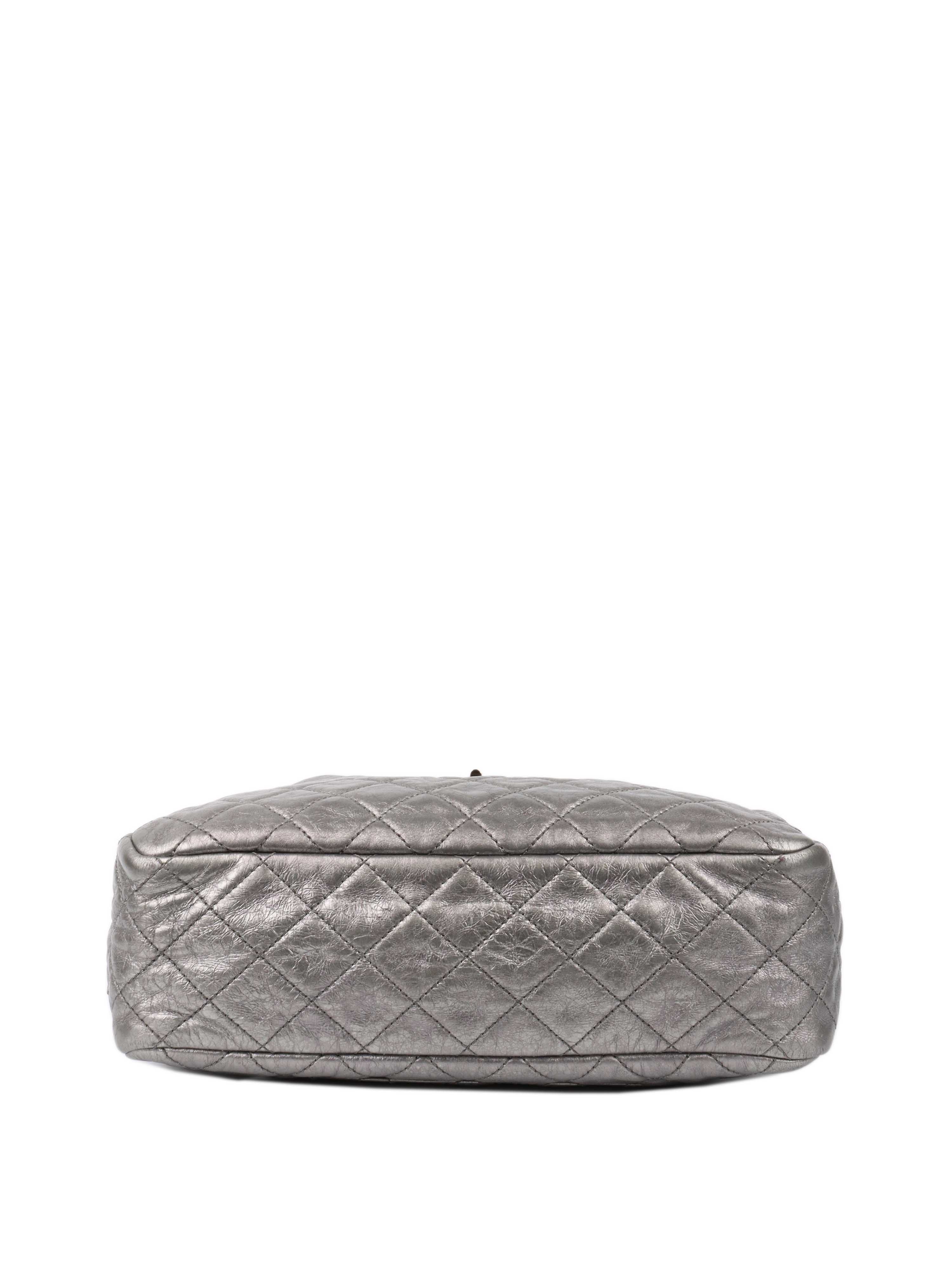 Chanel Metallic Silver 2.55 Reissue Camera Bag.