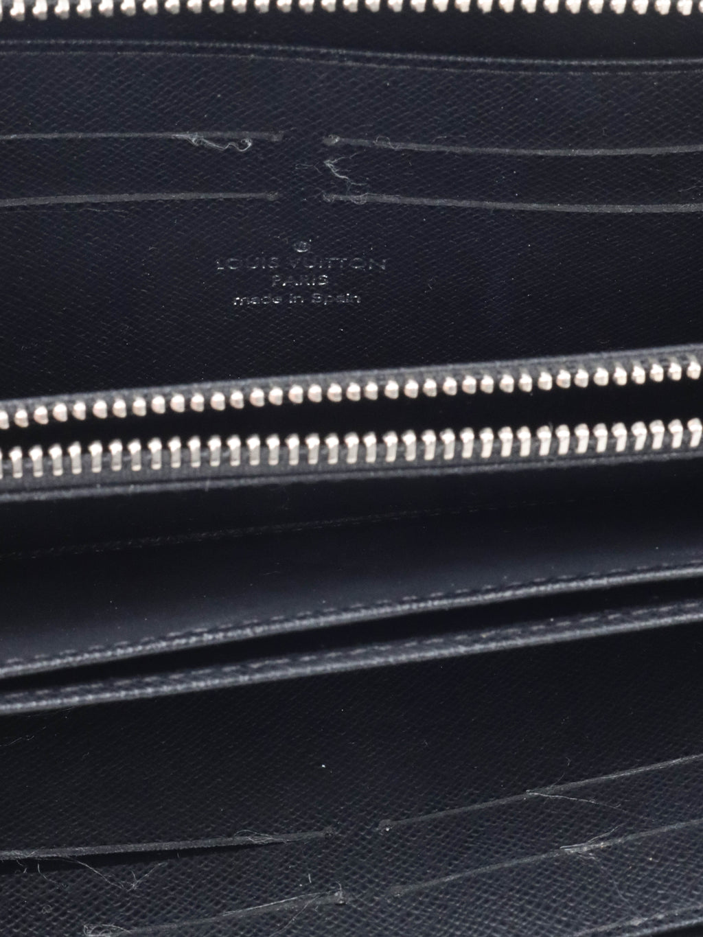 Louis Vuitton Black EPI Zipped Wallet.