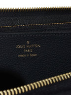 Louis Vuitton Black Monogram Empreinte Leather Clemence Wallet.