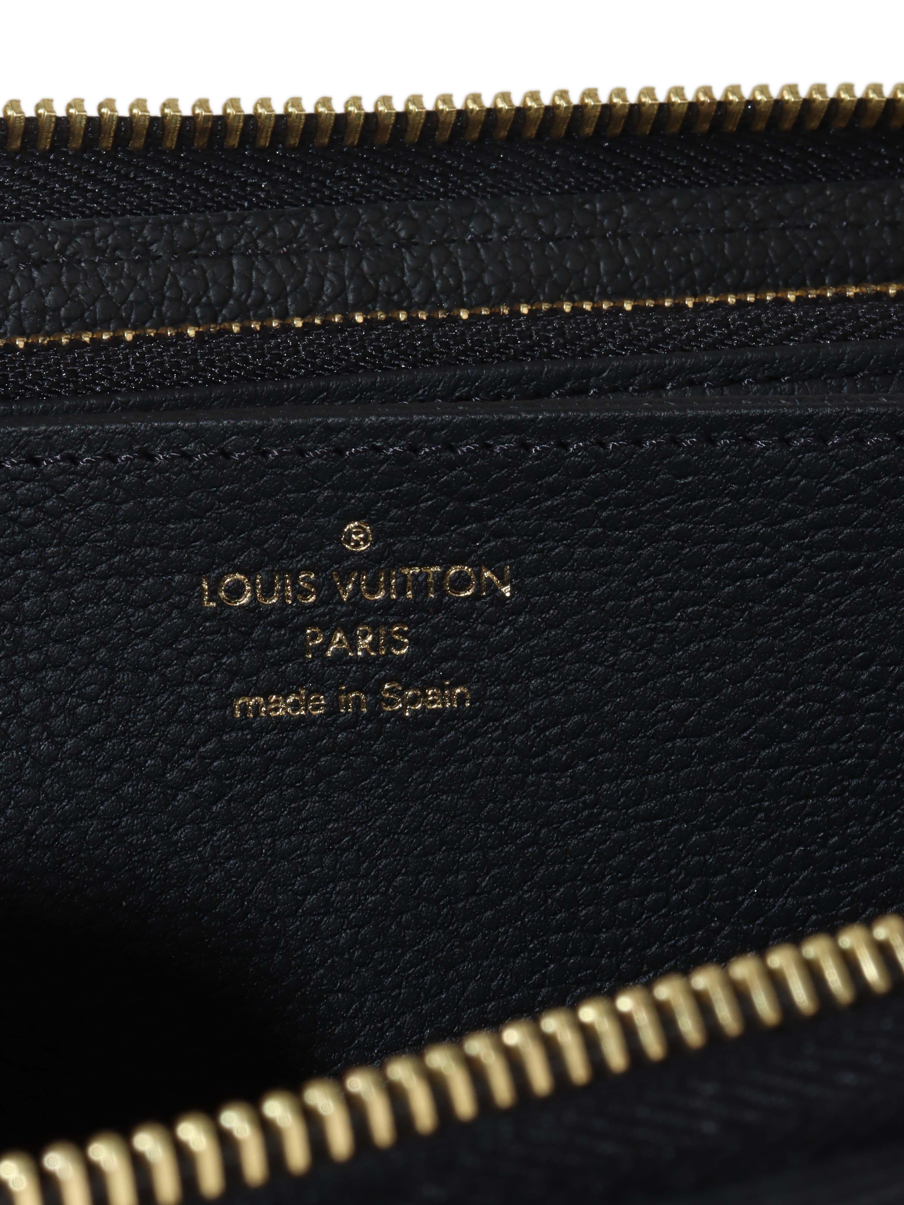 Louis Vuitton Black Monogram Empreinte Leather Clemence Wallet.