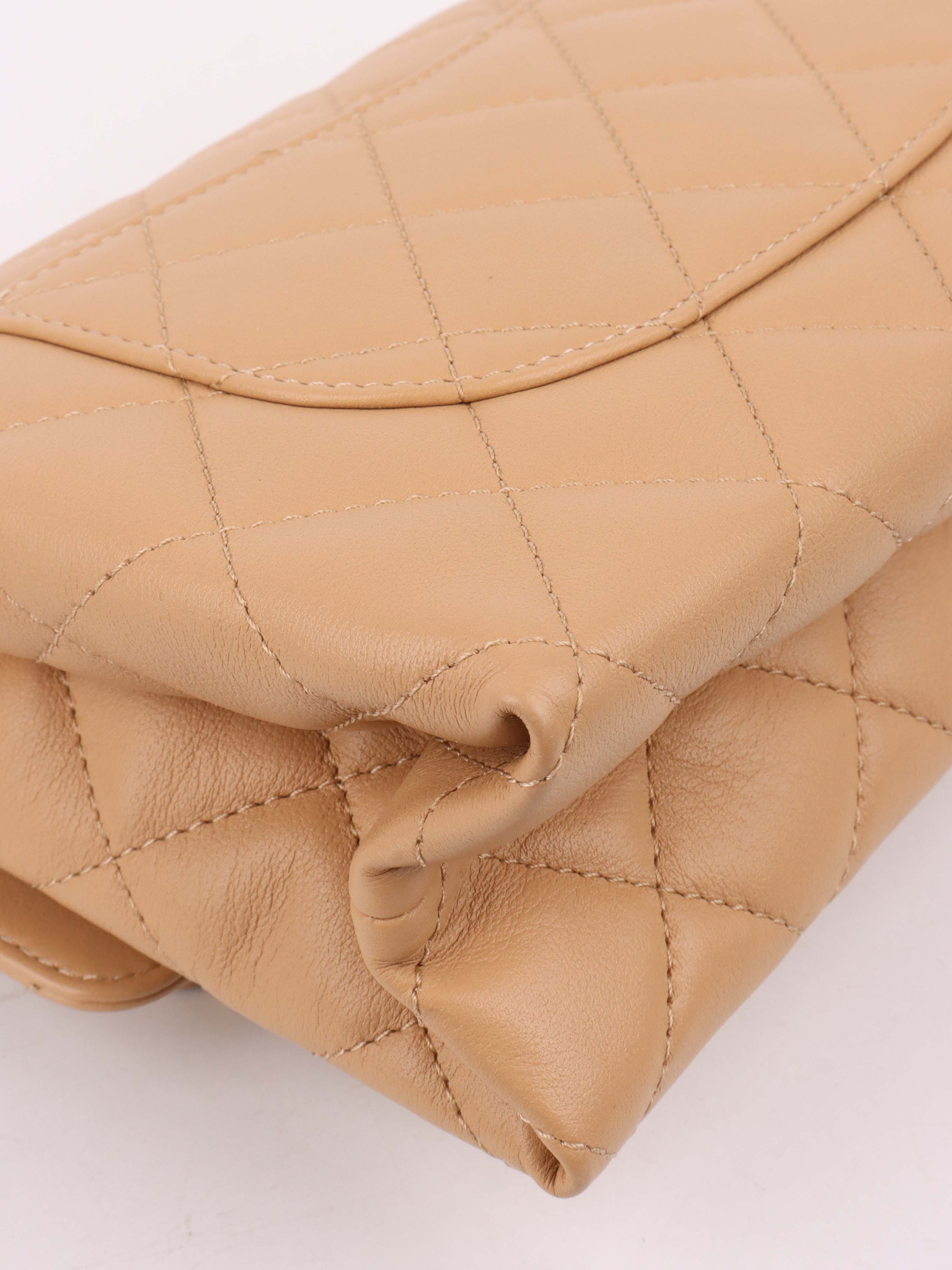 Chanel Beige Woven Chain Link Handle Flap Bag.