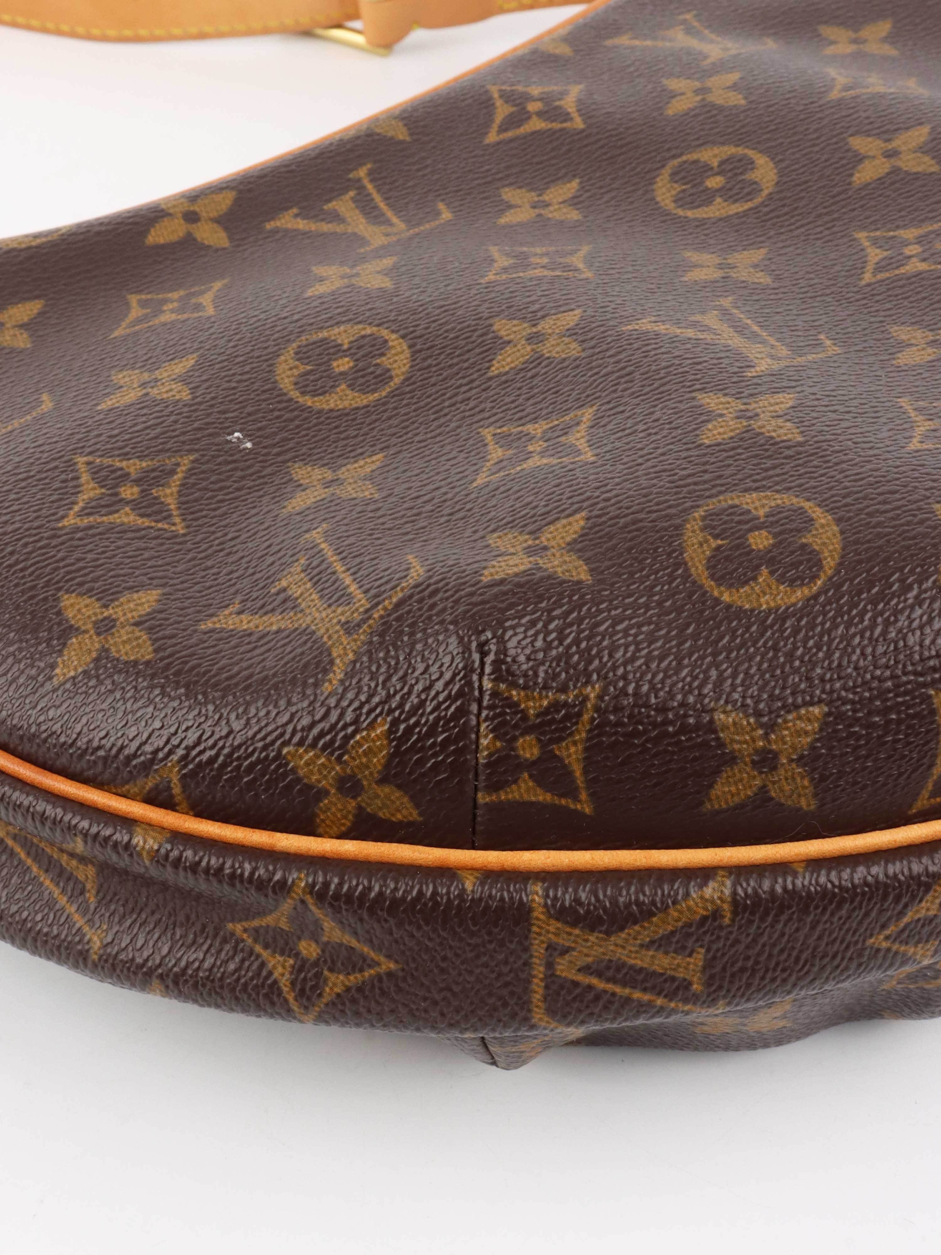 Louis Vuitton Vintage Croissant Bag.