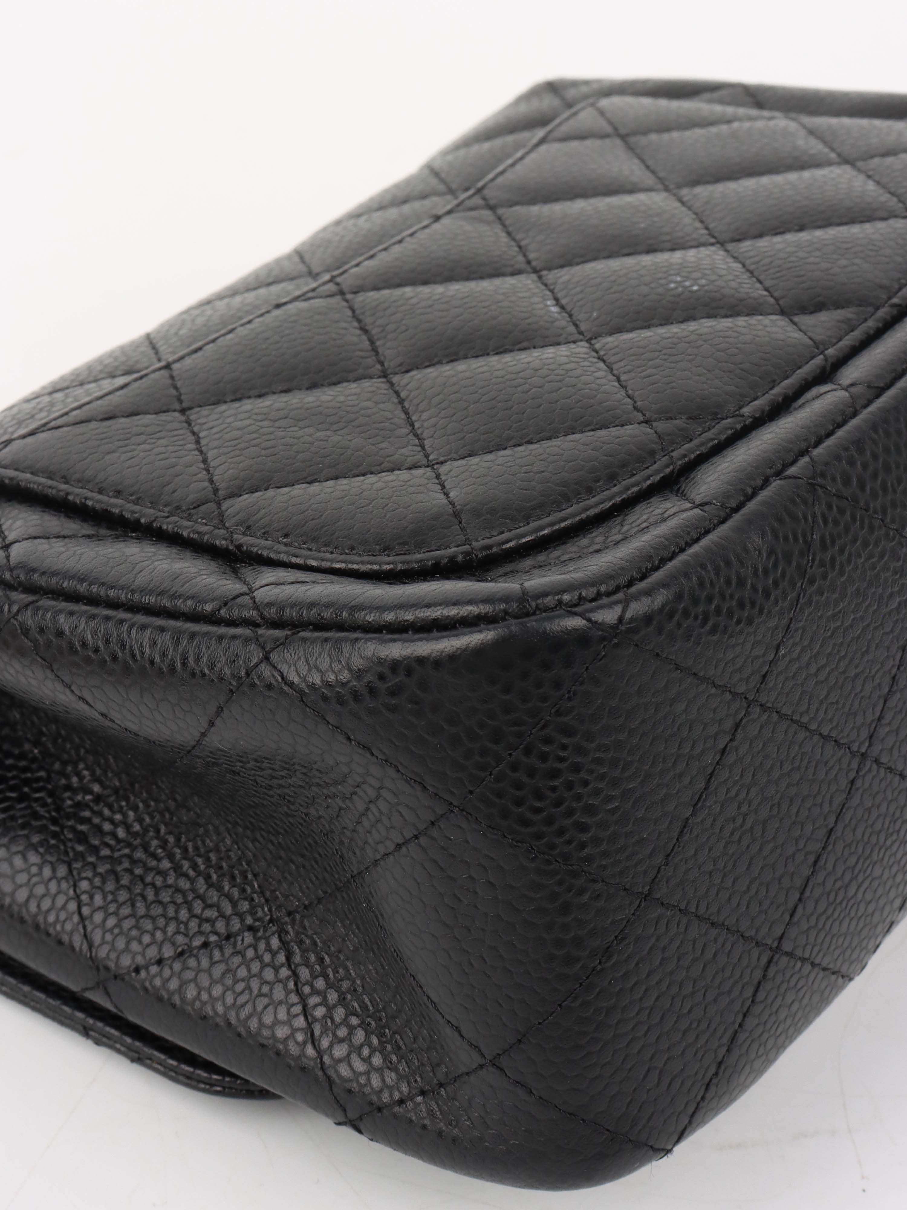 Chanel Black Mini Caviar Square Flap Bag.