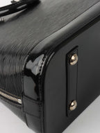Louis Vuitton Epi Leather Alma PM bag.
