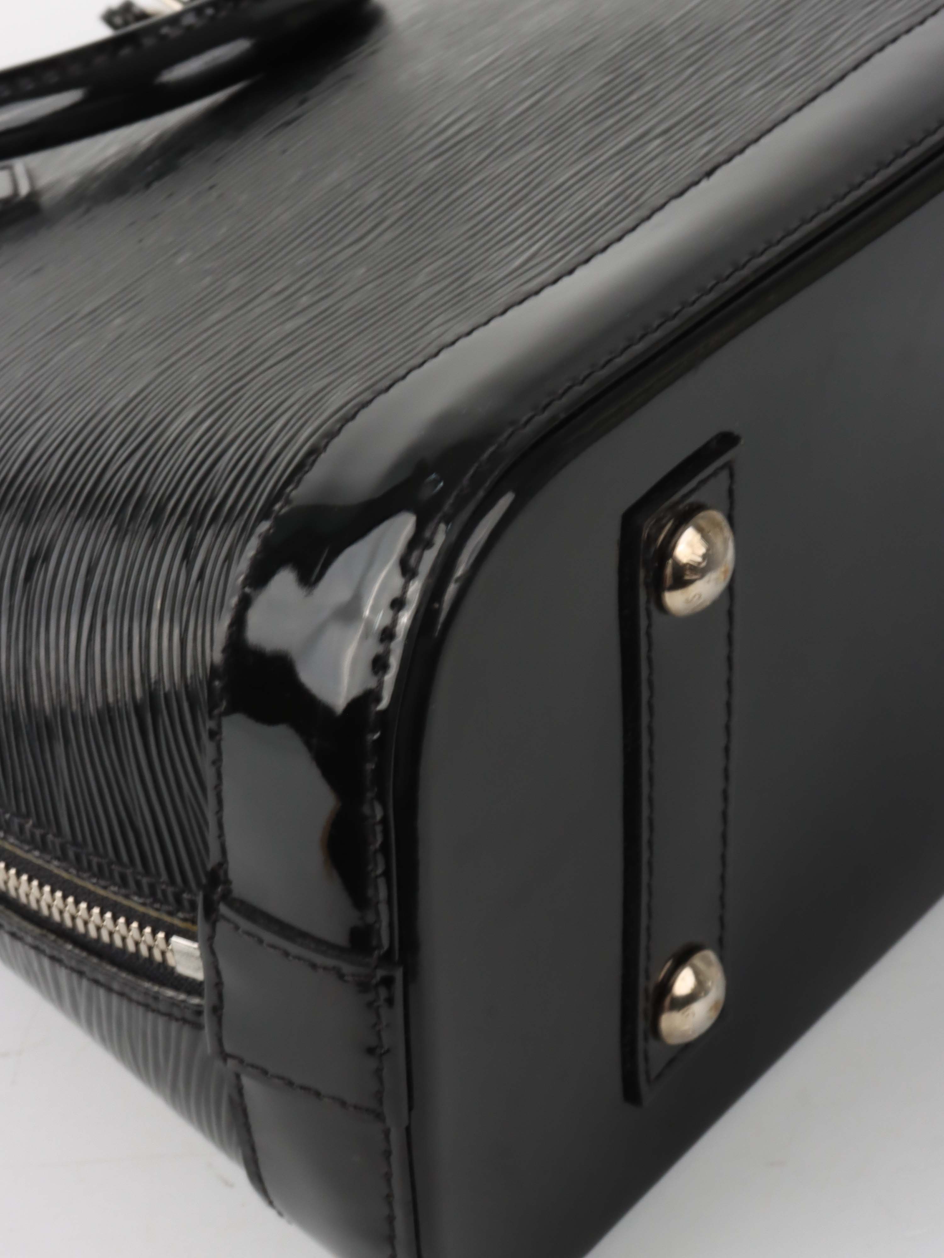 Louis Vuitton Epi Leather Alma PM bag.
