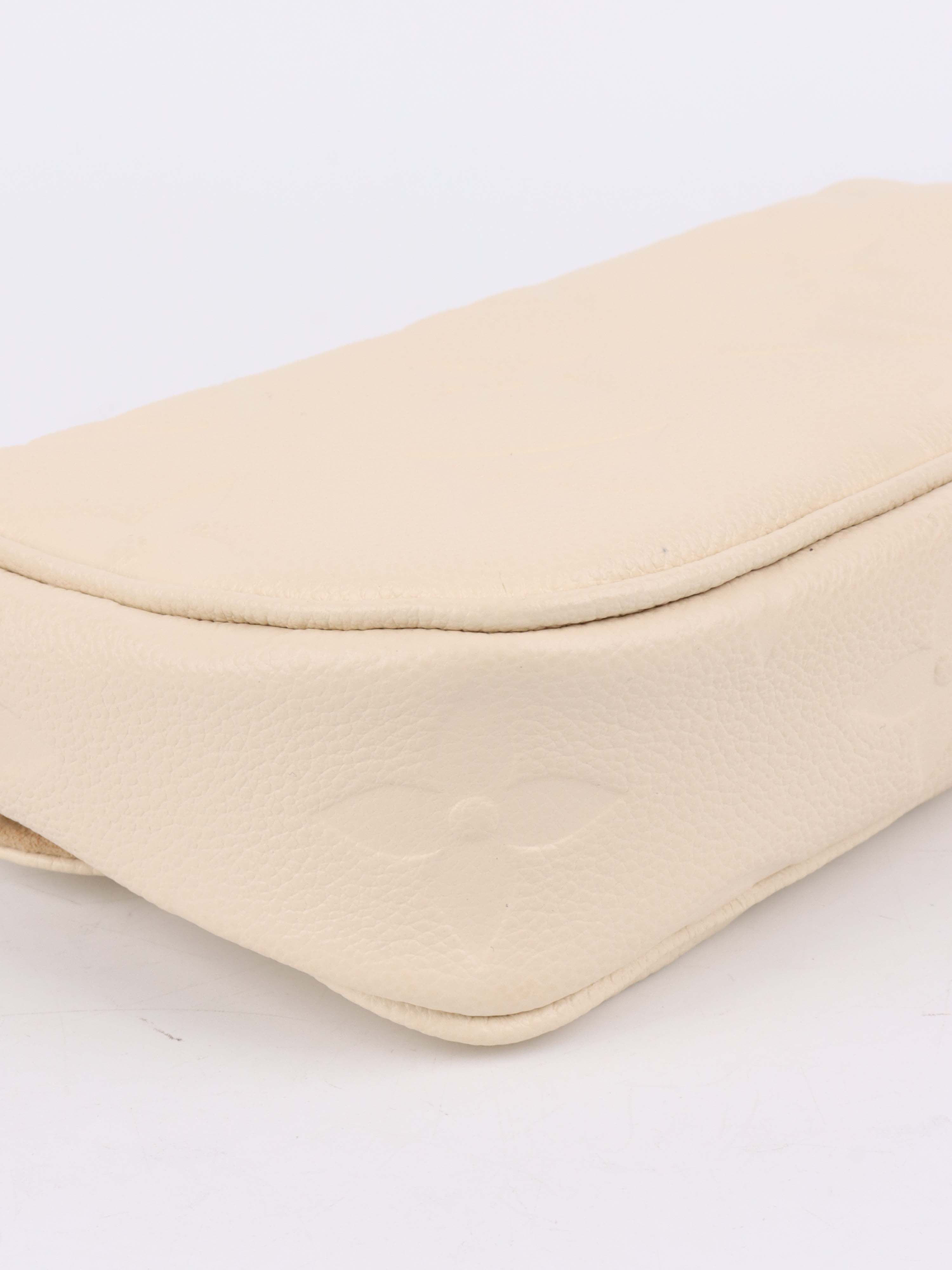 Louis Vuitton Cream Monogram Wallet on Chain Ivy.