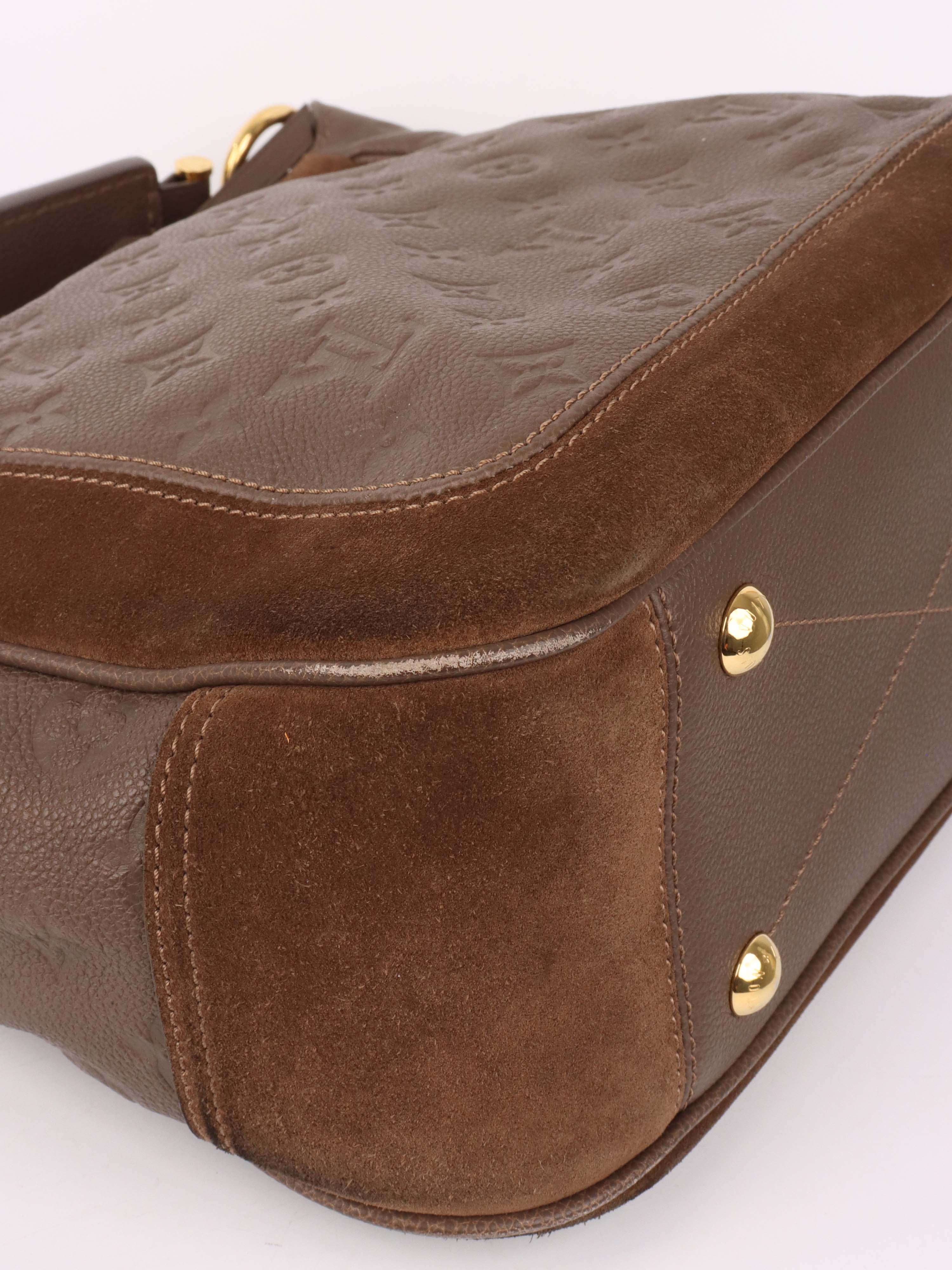 Louis Vuitton Terre Empreinte Monogram Audacieuse PM Bag.