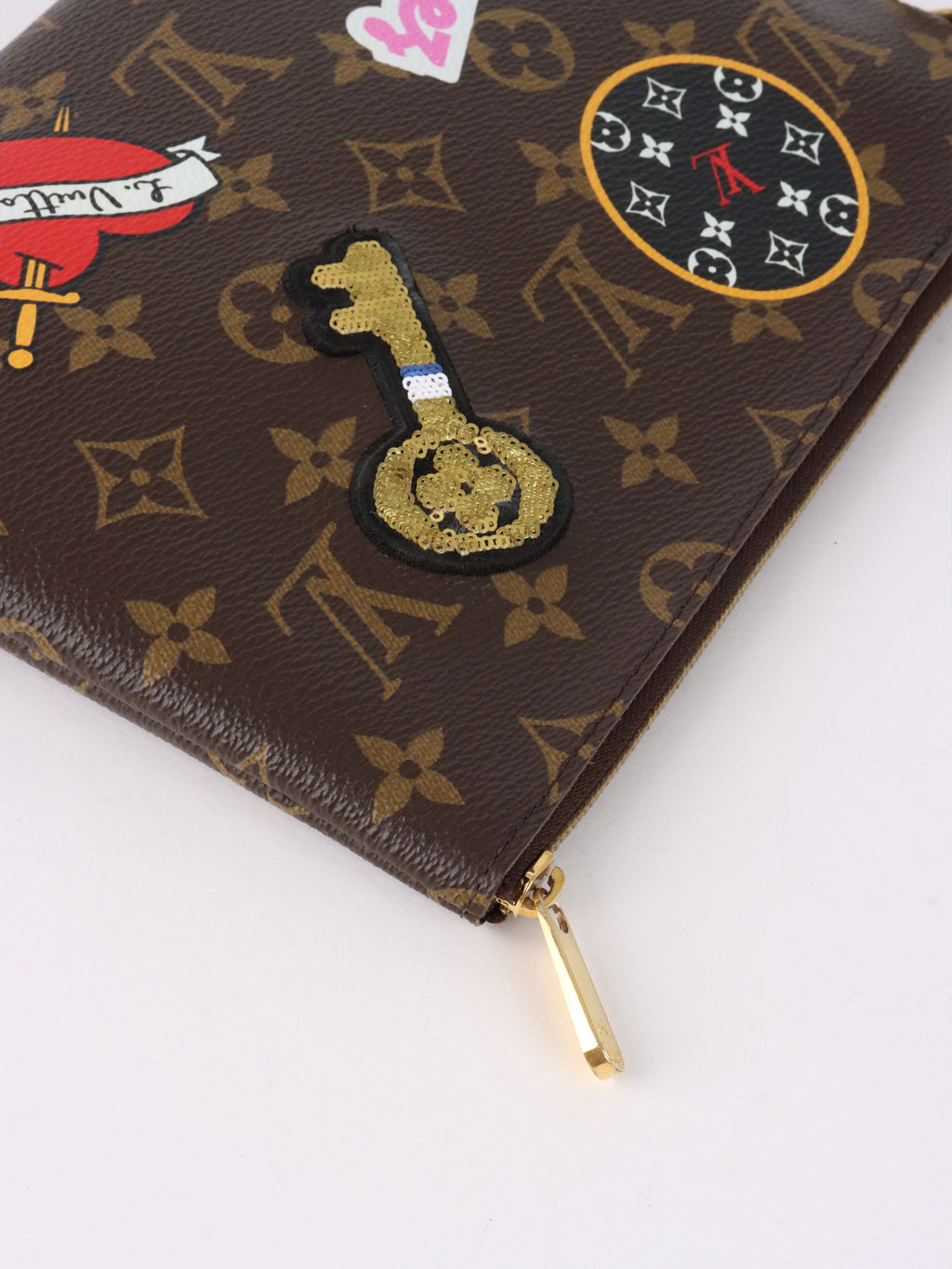 Louis Vuitton Limited Edition Monogram Patches City Pouch Bag.