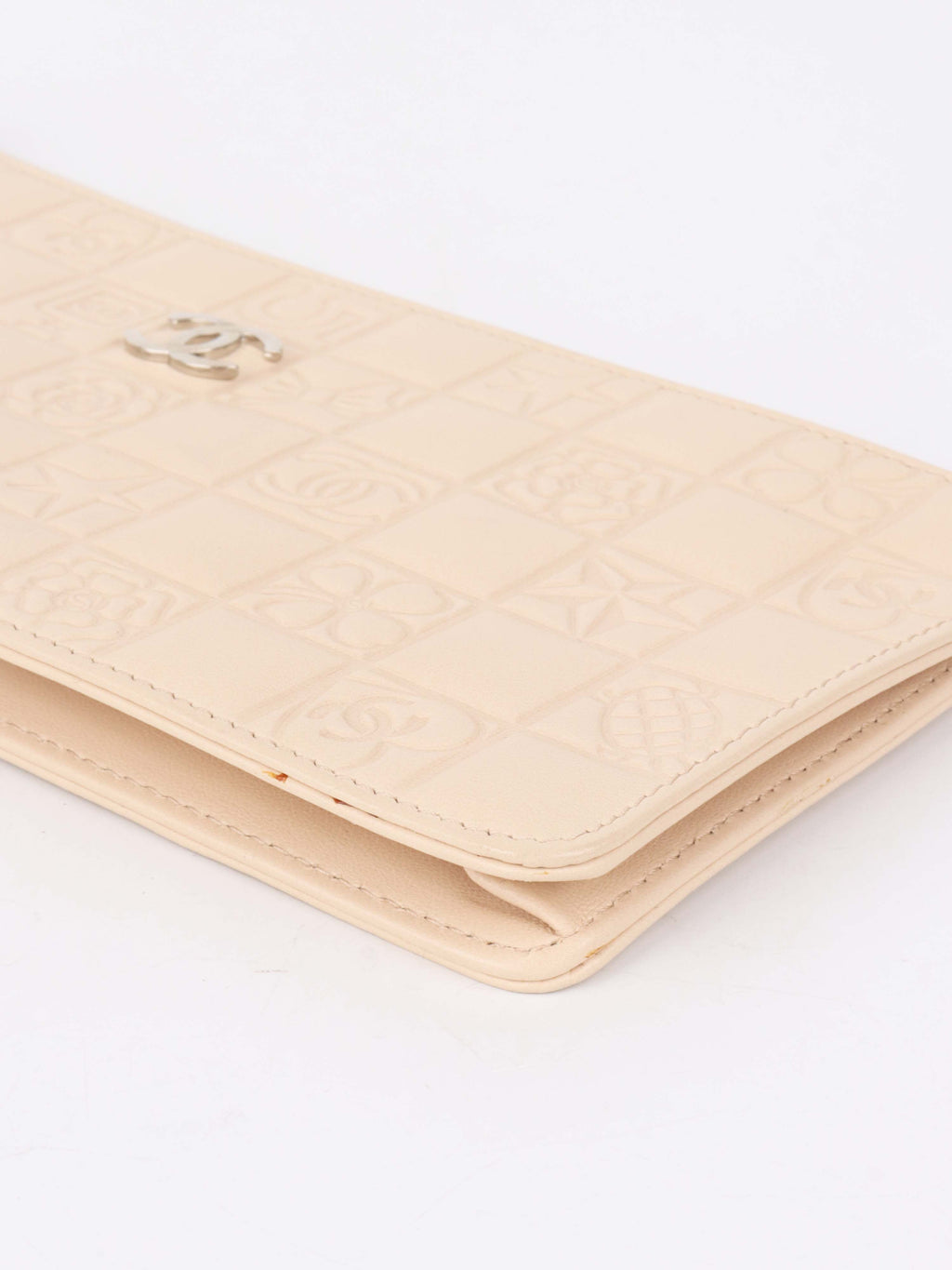 Chanel Beige Lucky Embossed Symbols Pochette with Wristlet Chain.