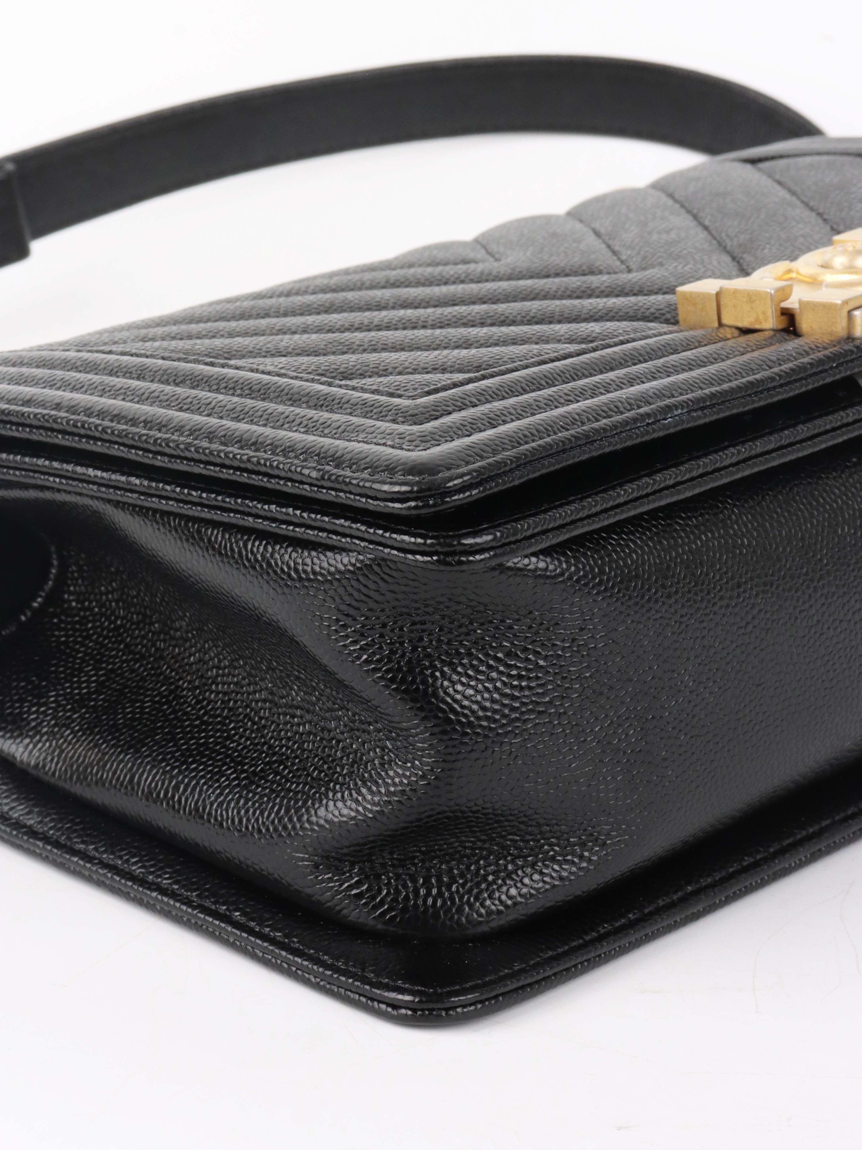 Chanel Black Chevron Caviar Medium Boy Bag.