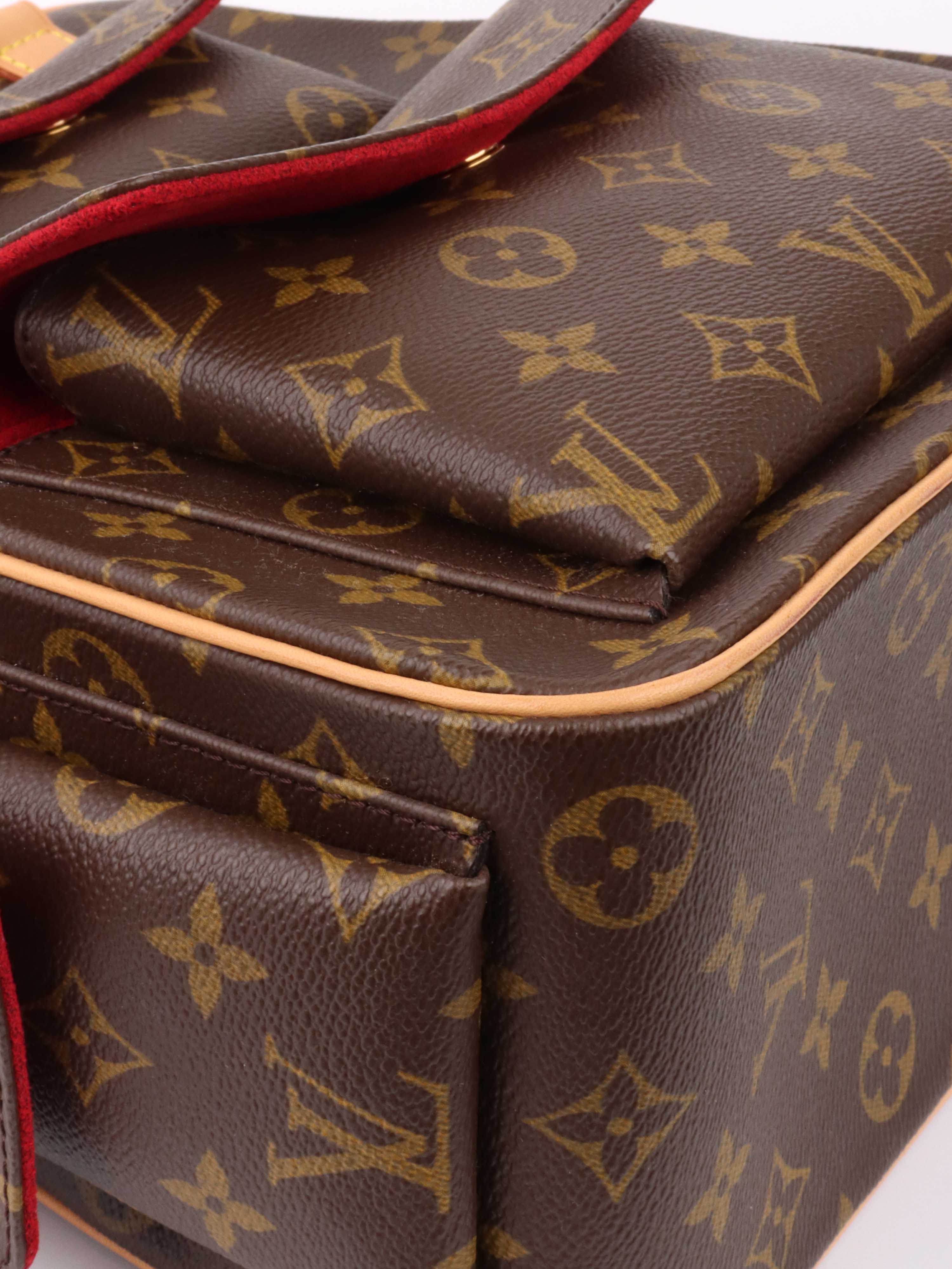 Louis Vuitton Monogram Excentri-Cite Handbag.