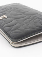 Chanel Black Camellia Wallet.