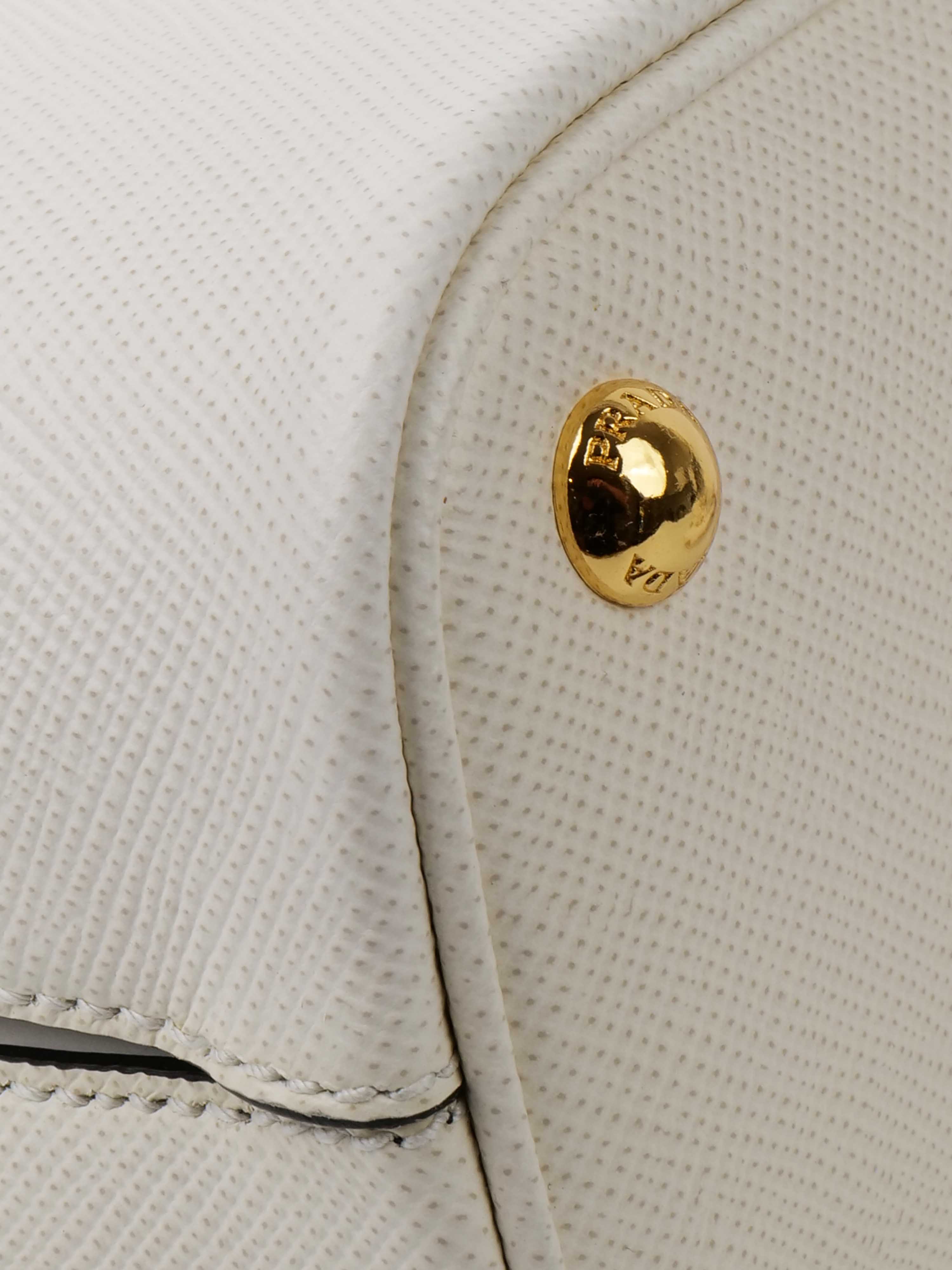 Prada Small Saffiano White Panier Bag.