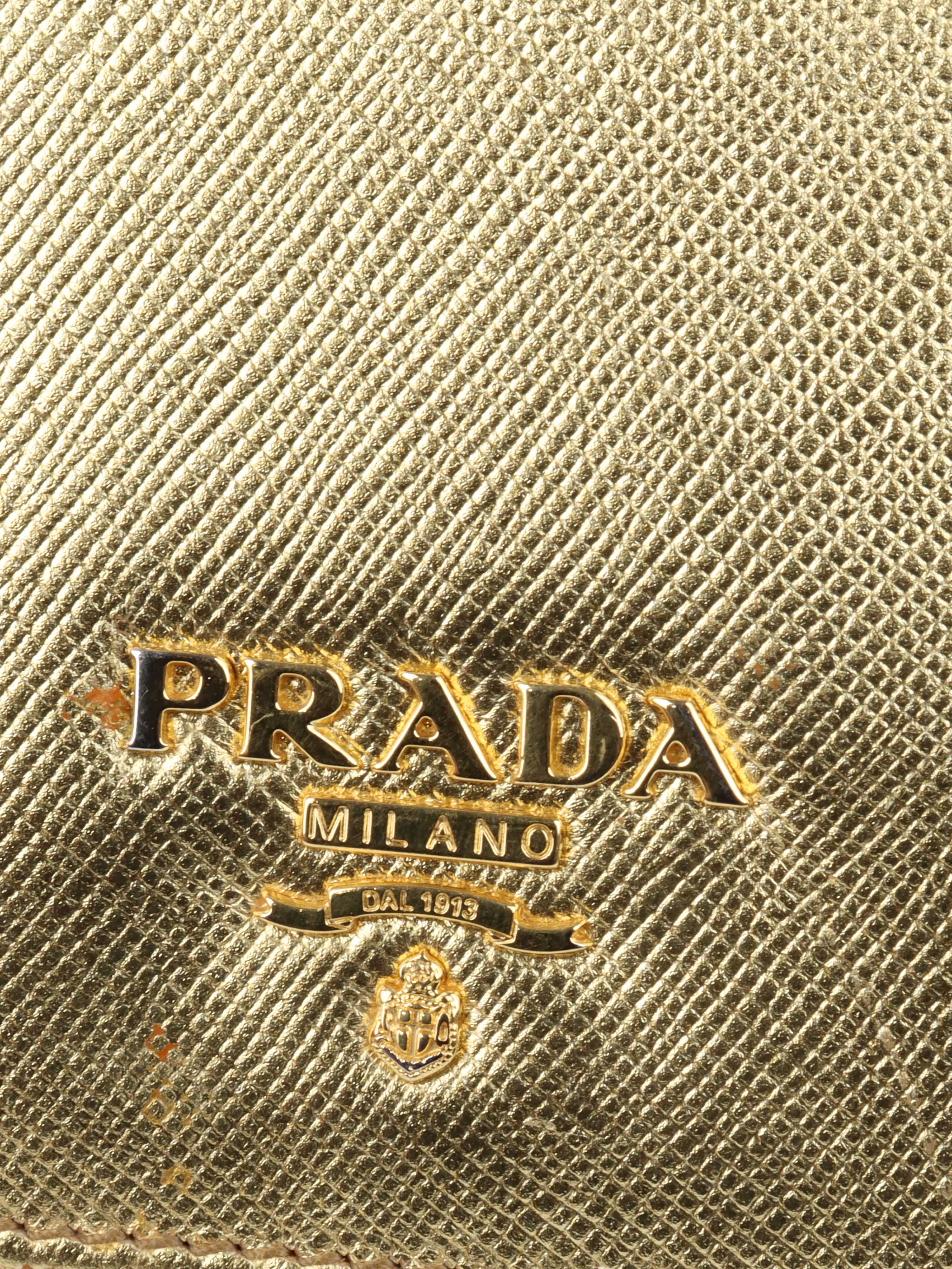 Prada Gold Saffiano Leather Wallet.