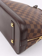 Louis Vuitton Damier Ebene Alma PM.