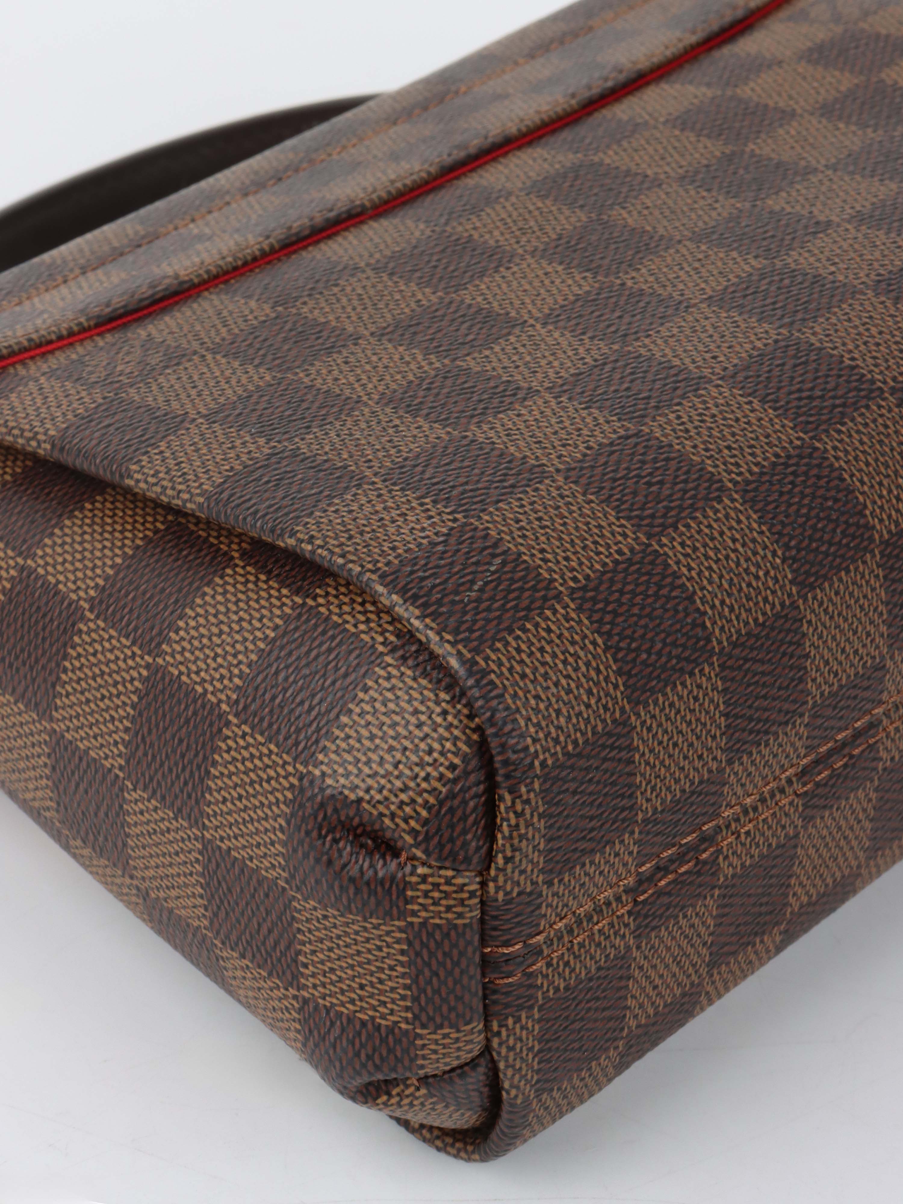 Louis vuitton Damier Ebene Croisette Bag.