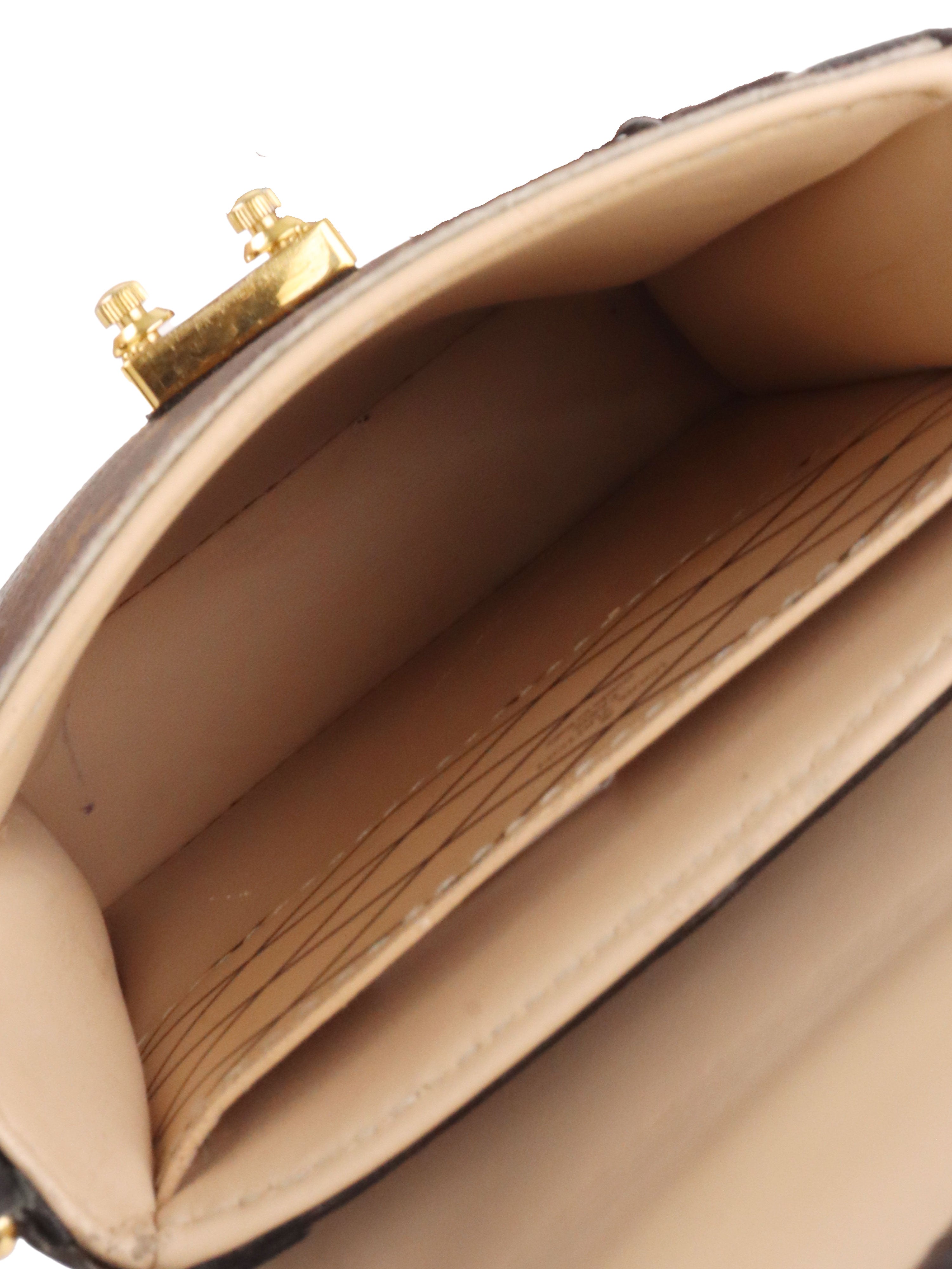 Louis Vuitton monogram Vertical Trunk Pochette.