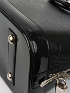 Louis Vuitton Epi Leather Alma PM bag.