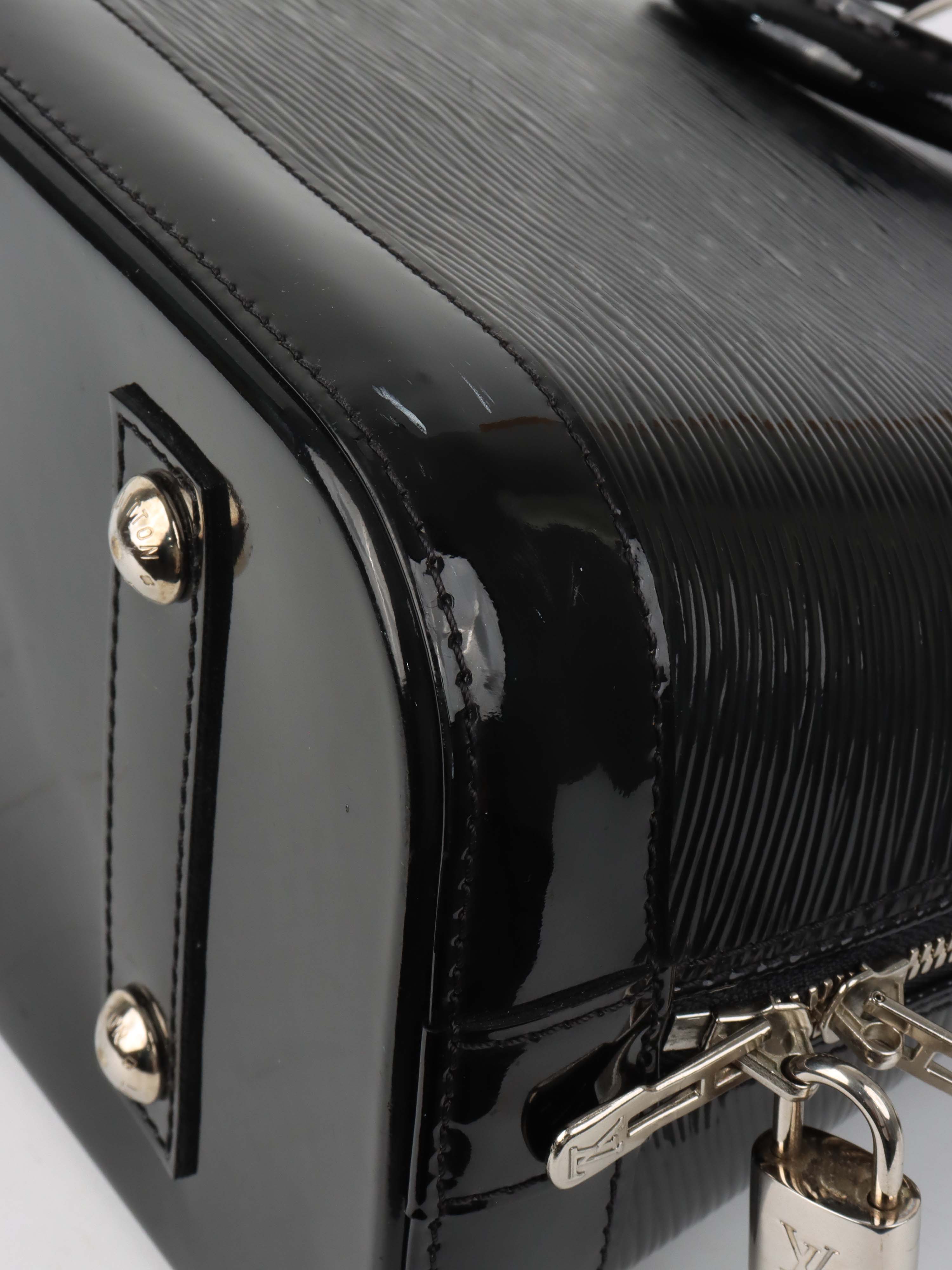 Louis Vuitton Epi Leather Alma PM bag.