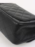 Chanel Black Mini Caviar Square Flap Bag.