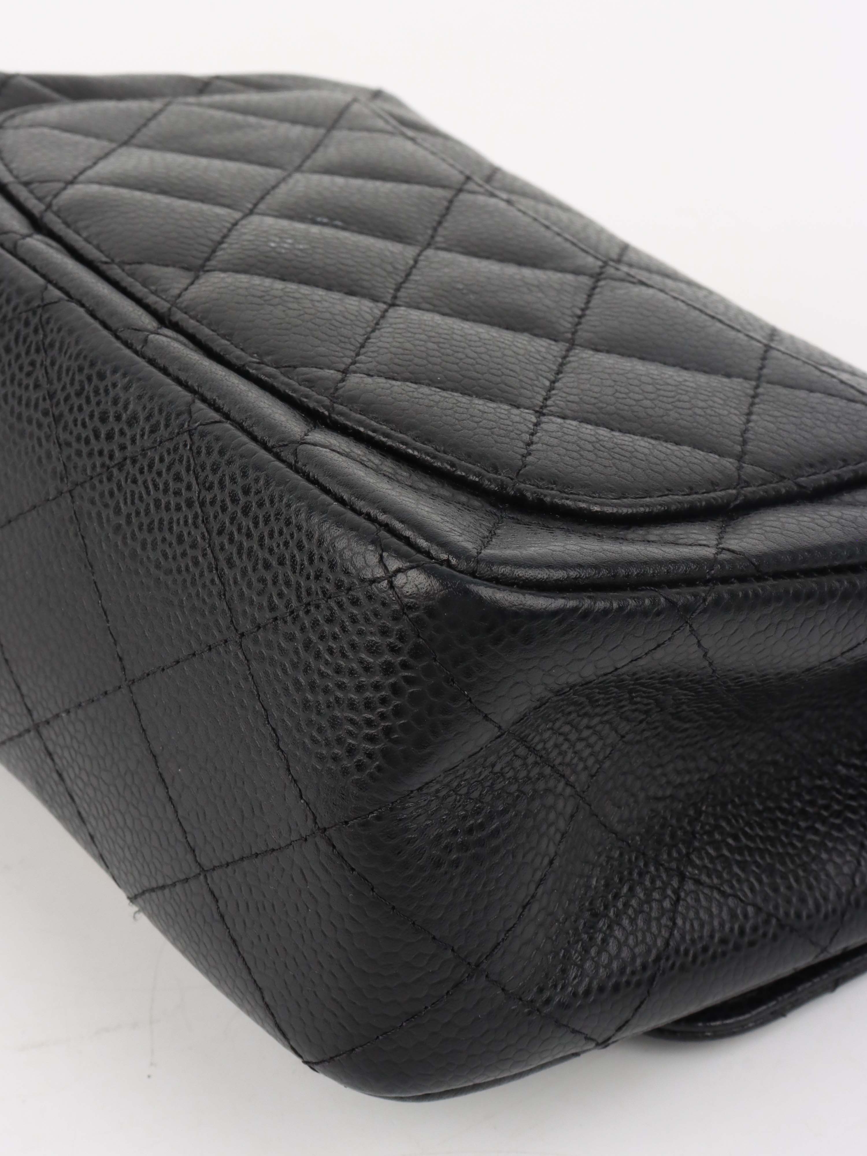 Chanel Black Mini Caviar Square Flap Bag.