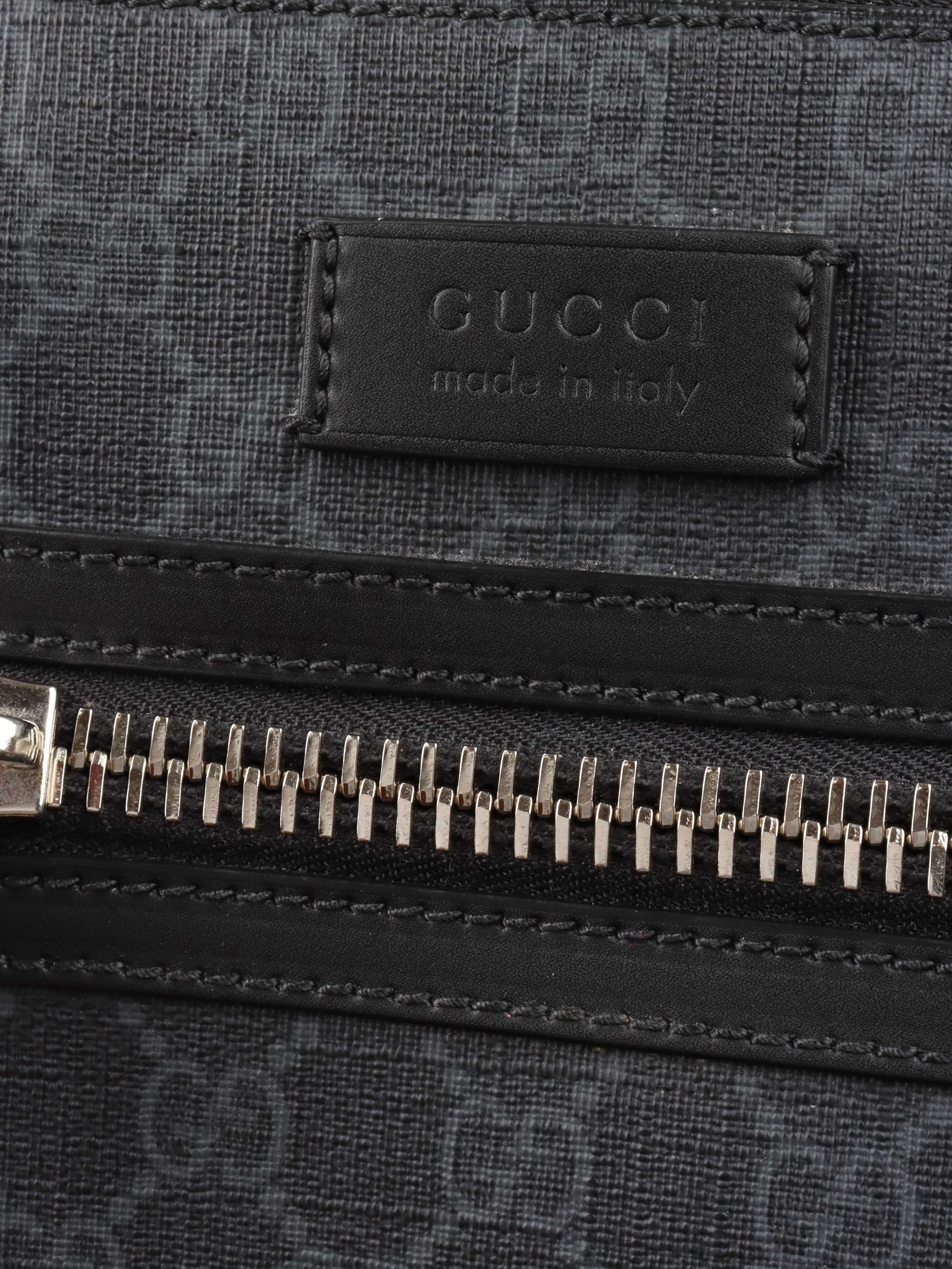 Gucci Black Monogram Messenger Bag.