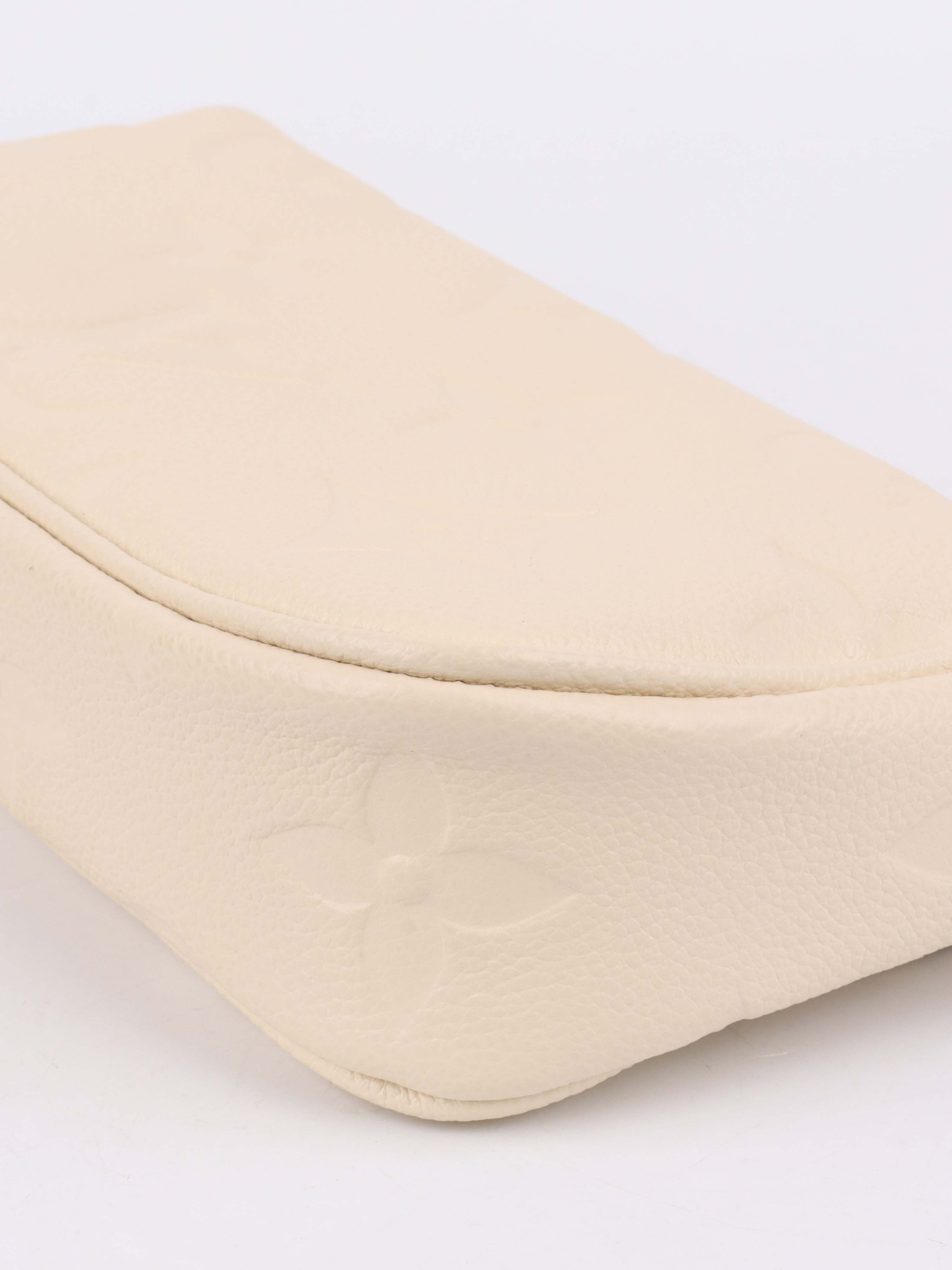 Louis Vuitton Cream Monogram Wallet on Chain Ivy.