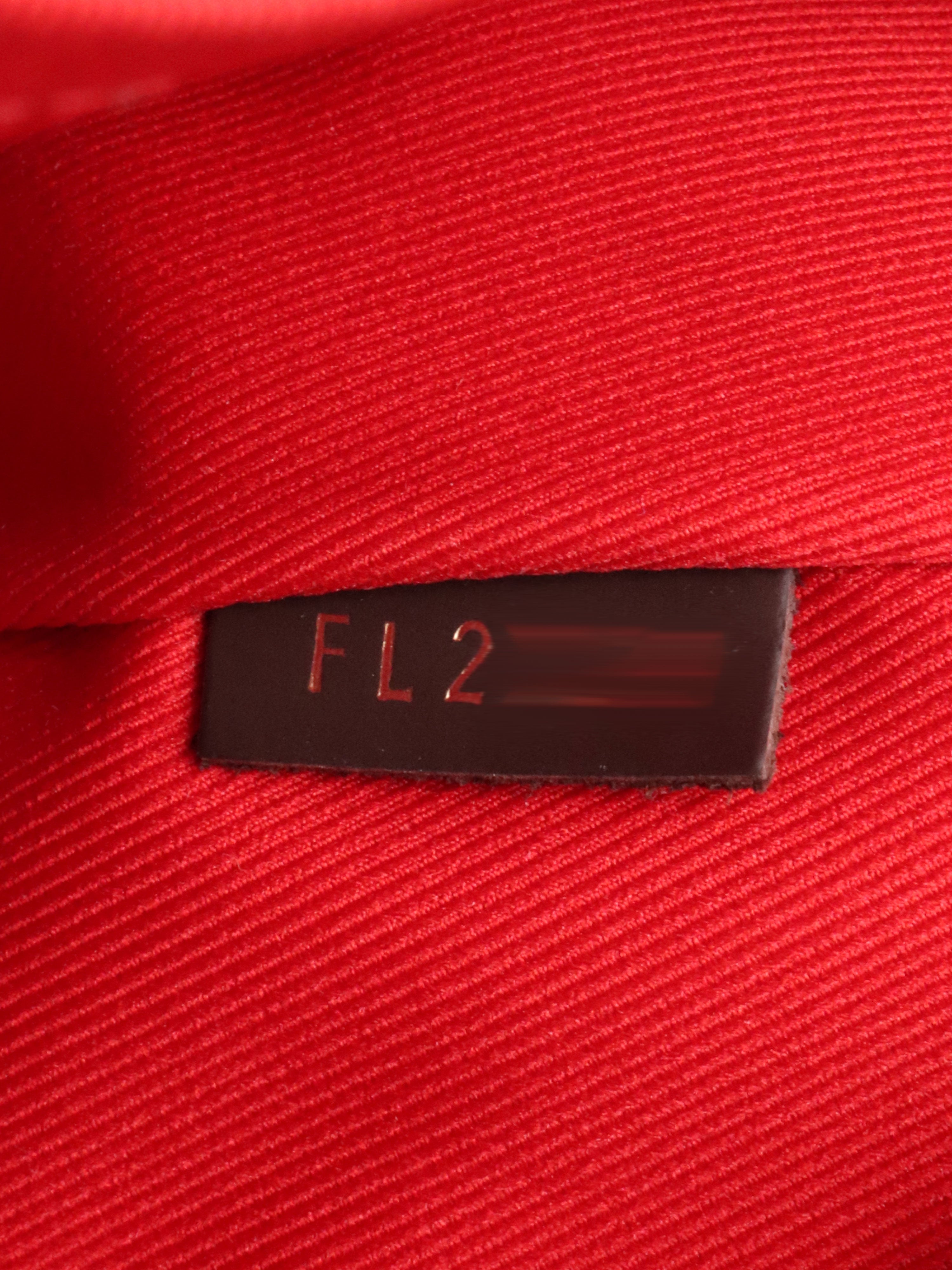 Louis Vuitton Damier Ebene Croisette Bag.