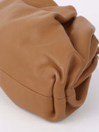 Bottega Veneta Mini Pouch in Tan.