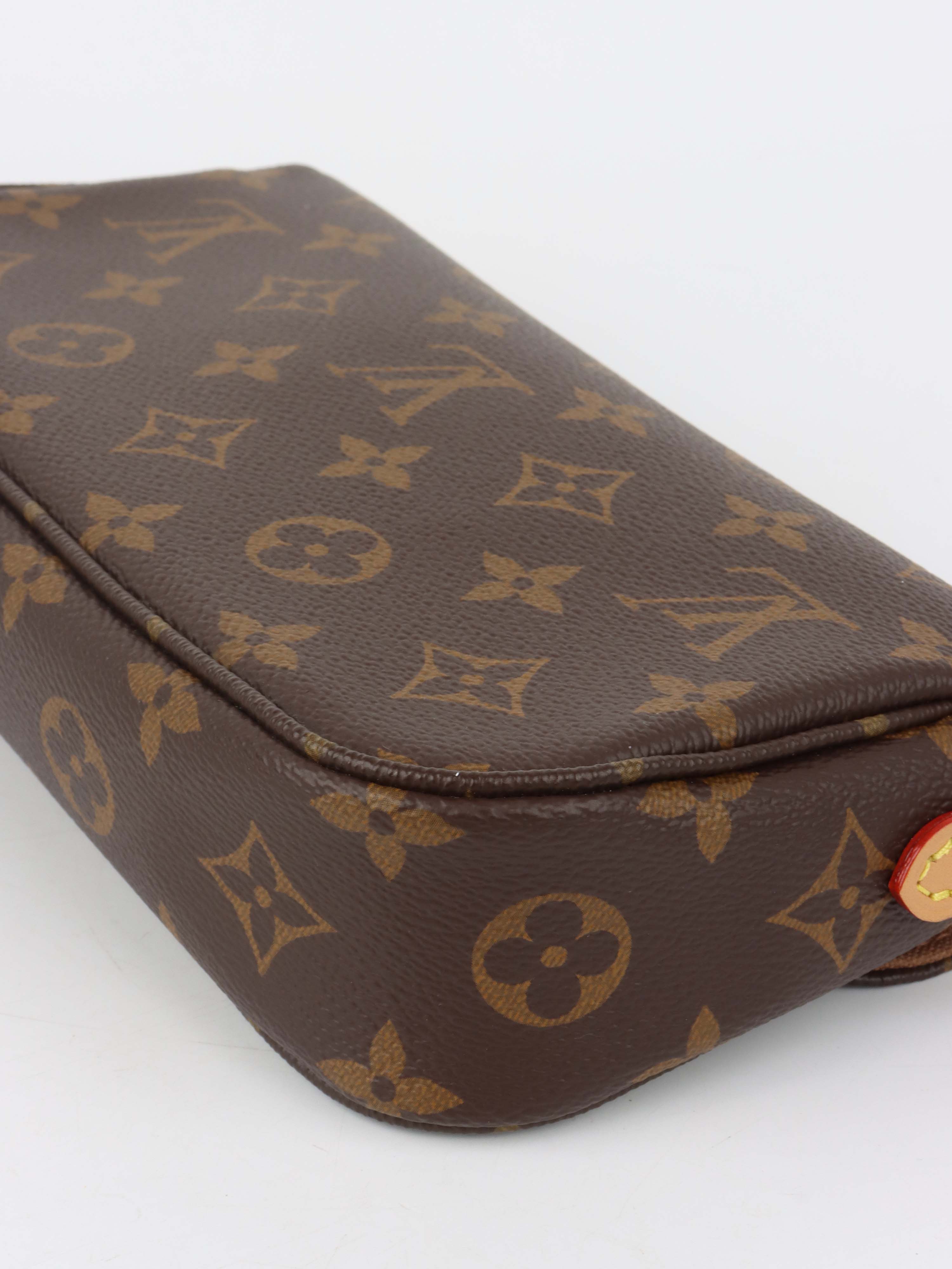 Louis Vuitton Monogram Wallet on Chain Ivy.