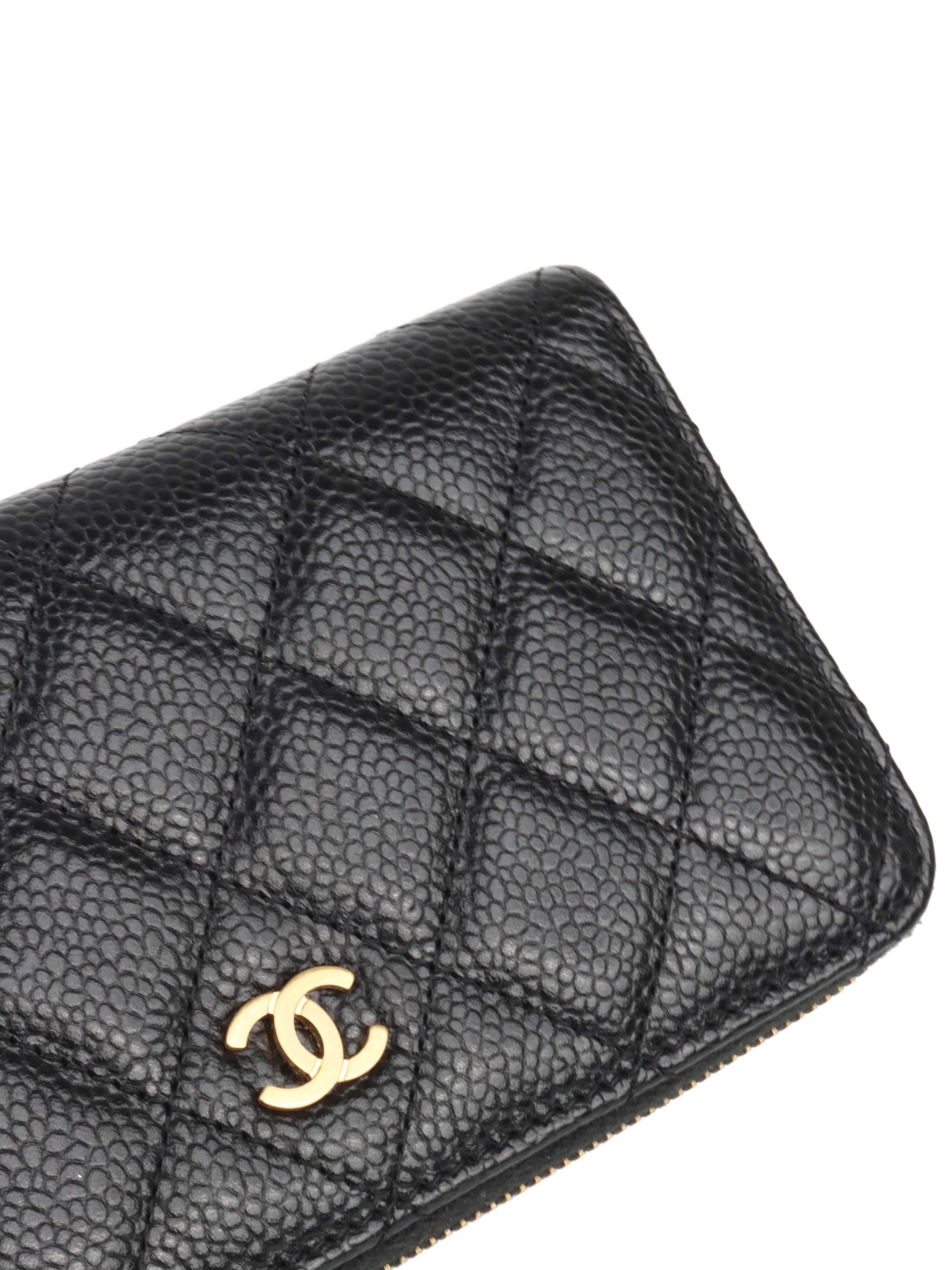 Chanel Zip Around Black Caviar Wallet.