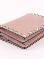 Valentino Garavani Pink Rockstud Cross Body Bag.