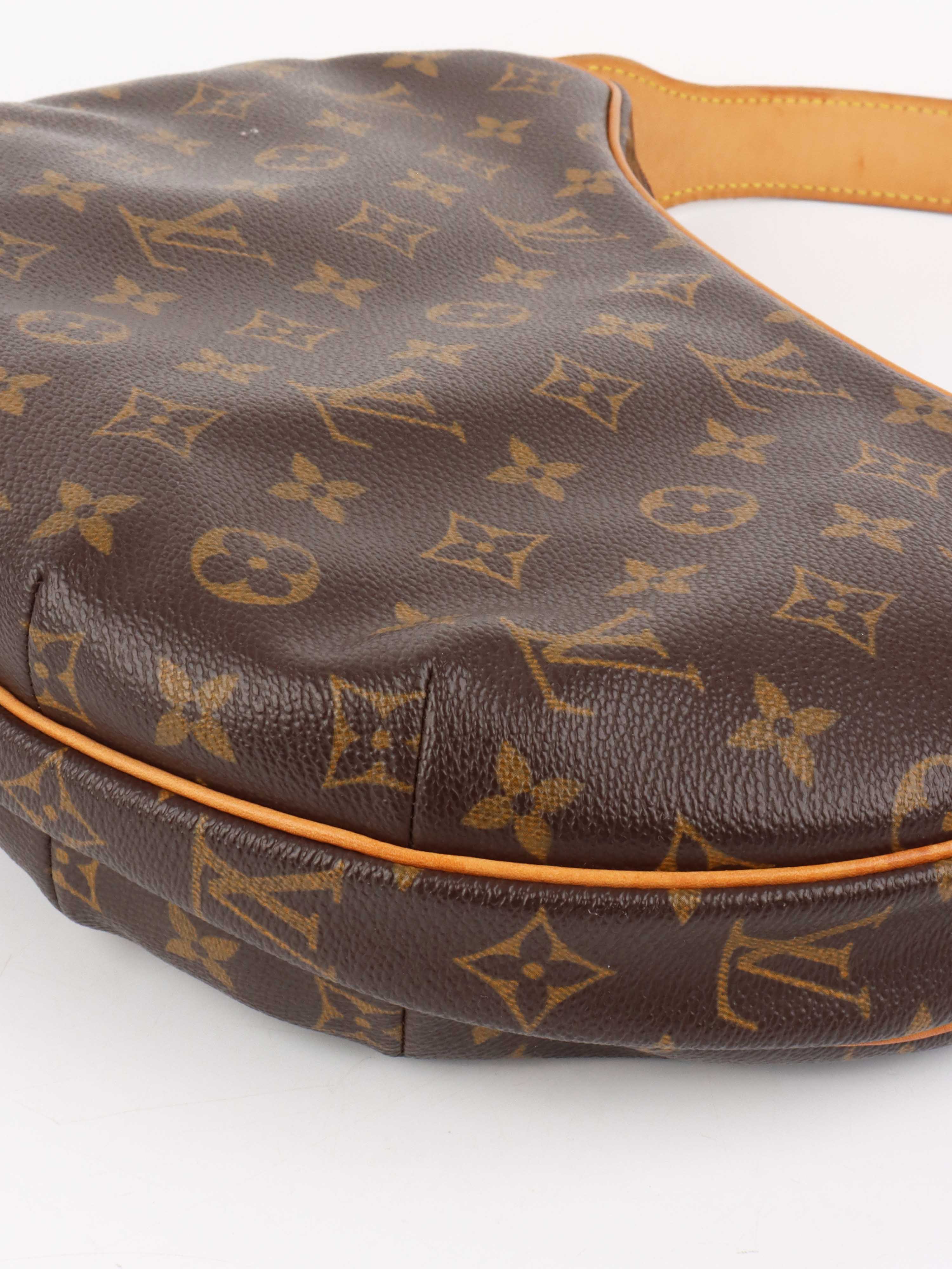 Louis Vuitton Vintage Croissant Bag.