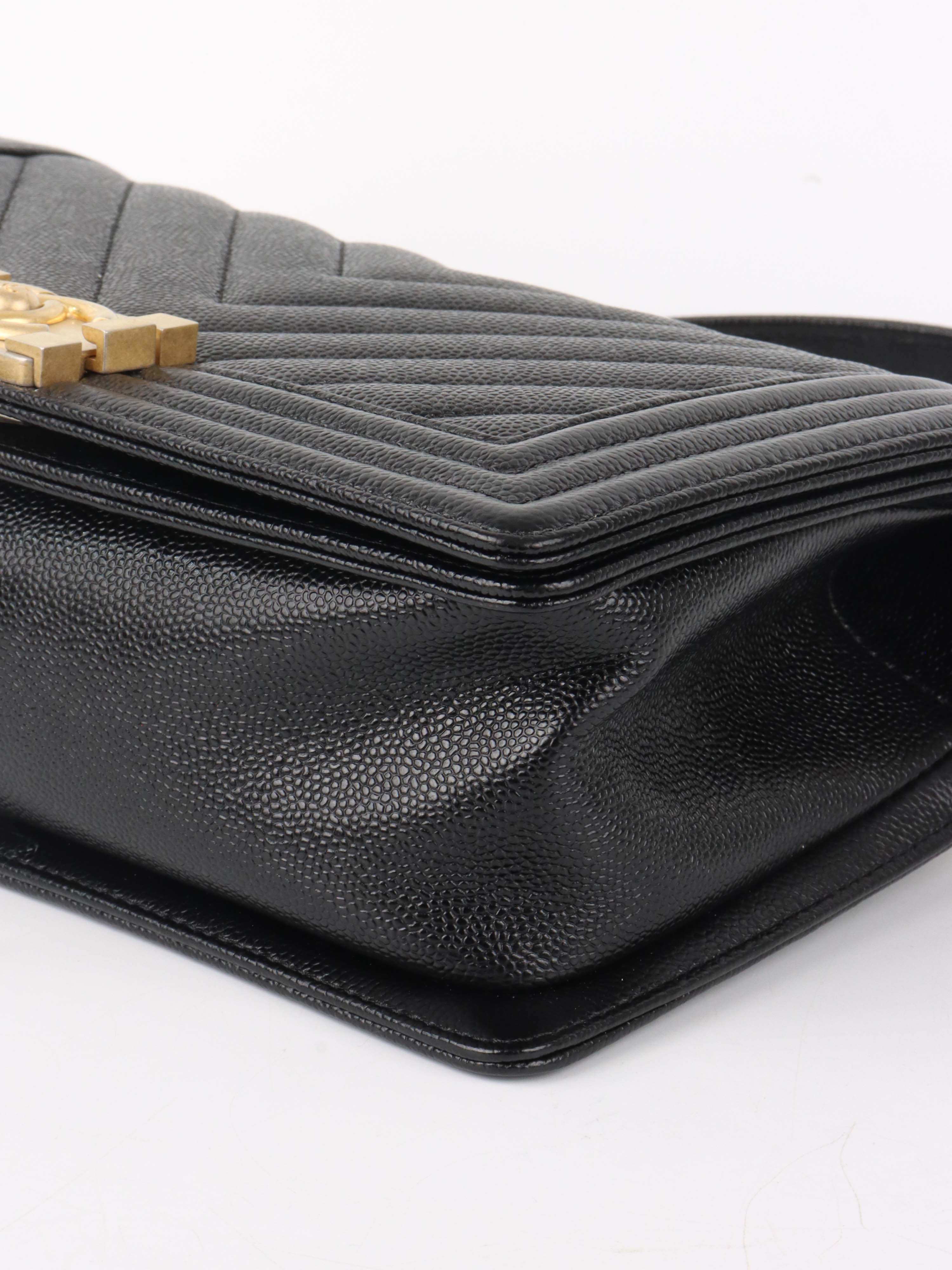 Chanel Black Chevron Caviar Medium Boy Bag.